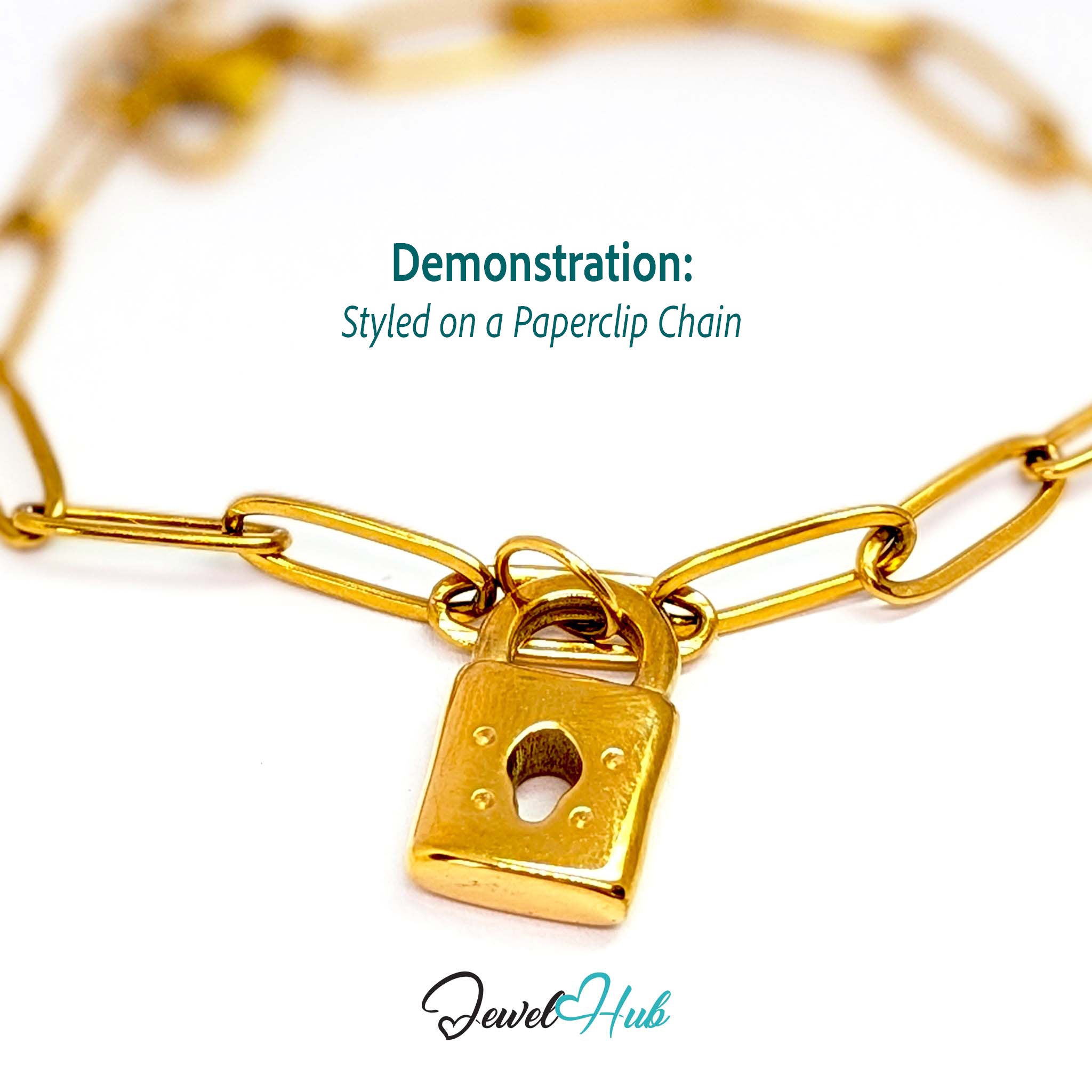 Classic padlock charm in gold stainless steel - styled on a gold paperclip chain bracelet - JewelHub