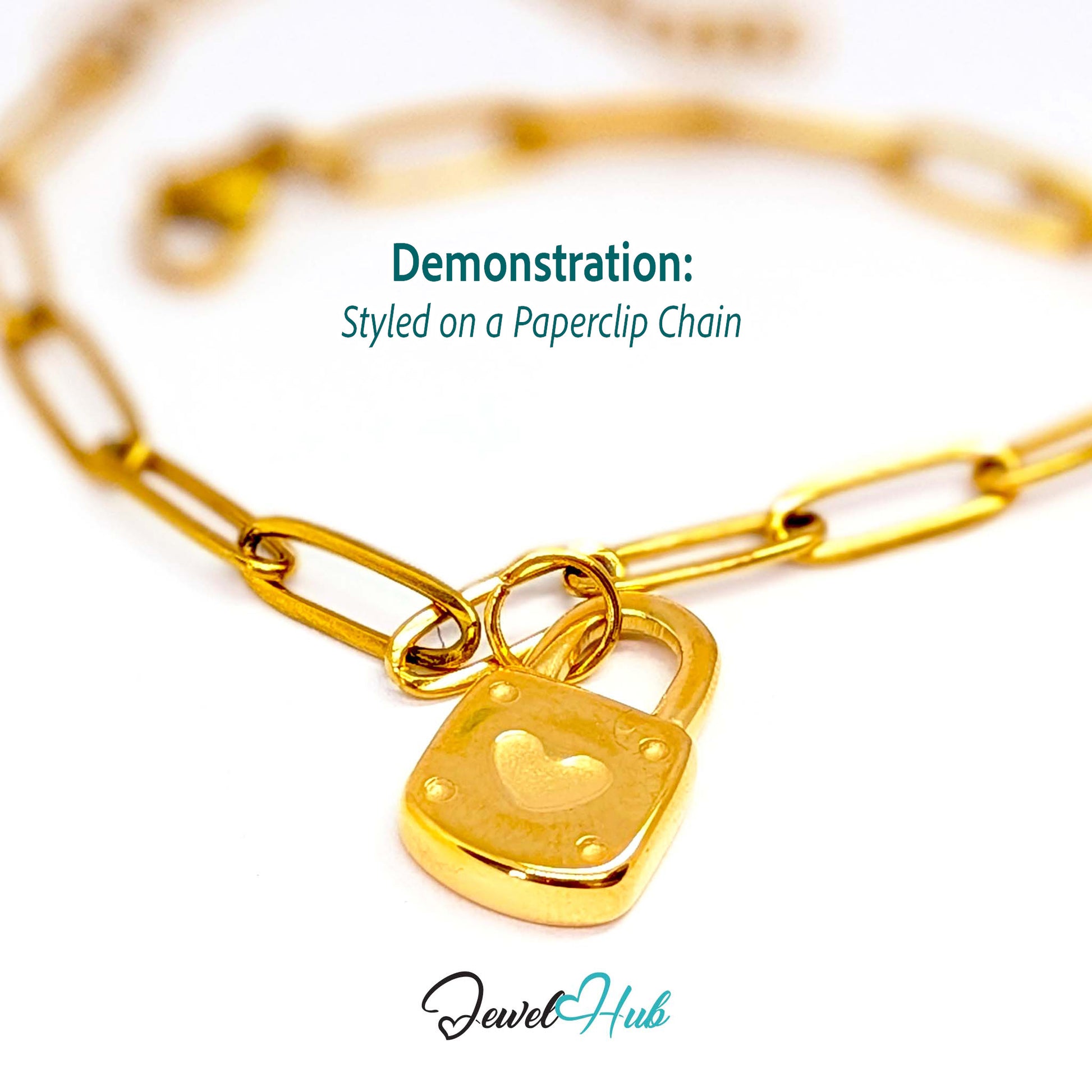 Heart padlock charm in gold stainless steel - styled on a gold paperclip chain bracelet - JewelHub