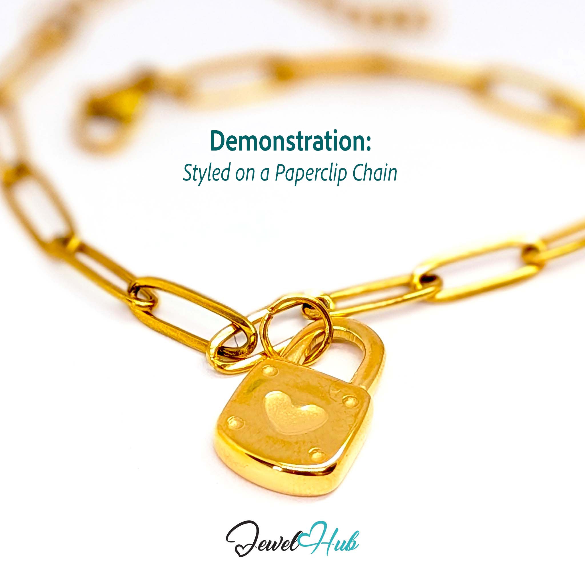 Heart padlock charm in gold stainless steel - styled on a gold paperclip chain bracelet - JewelHub