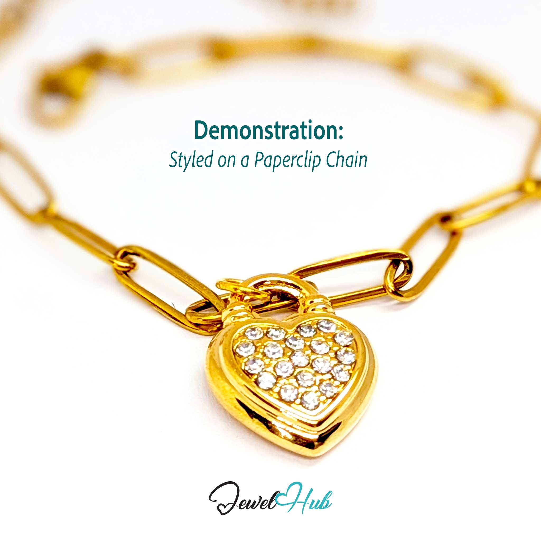 Pave heart padlock charm in gold stainless steel - styled on a gold paperclip chain bracelet - JewelHub