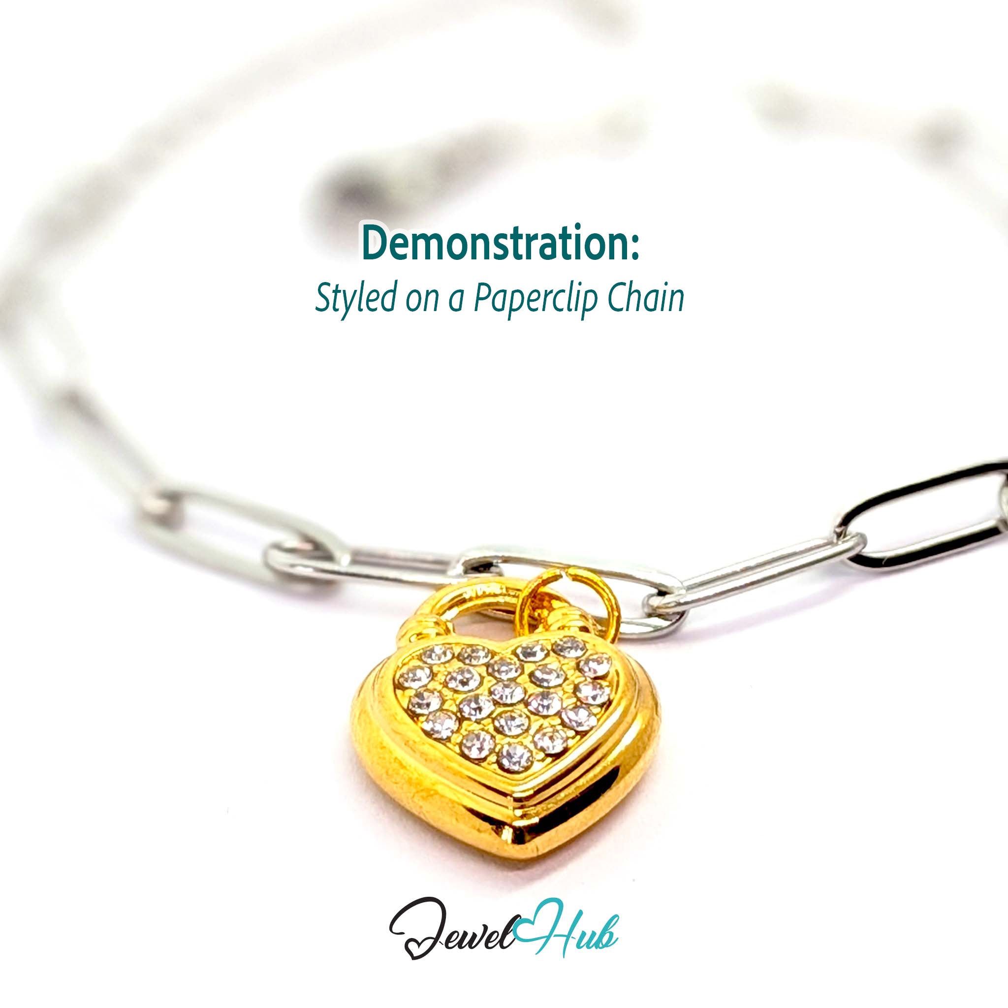 Pave heart padlock charm in gold stainless steel - styled on a silver paperclip chain bracelet - JewelHub