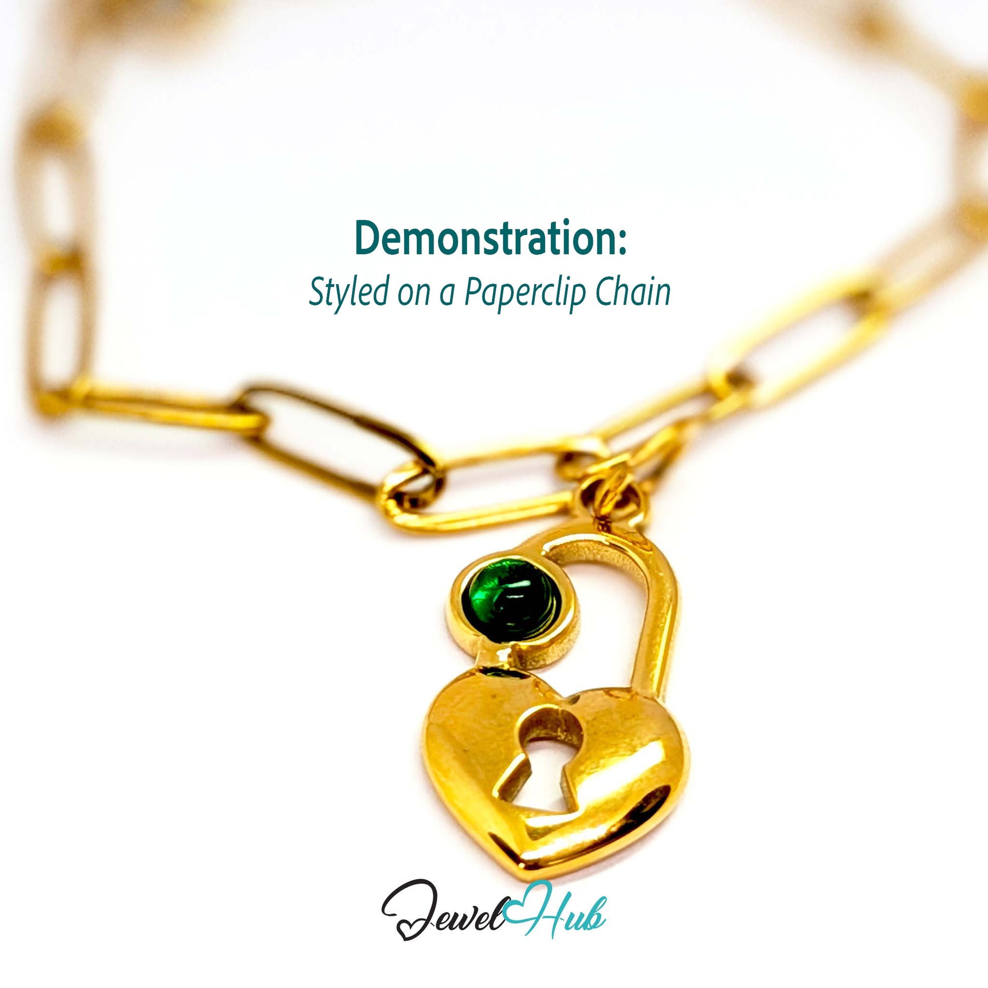 Green stone heart lock charm in gold stainless steel - styled on a gold paperclip chain bracelet - JewelHub