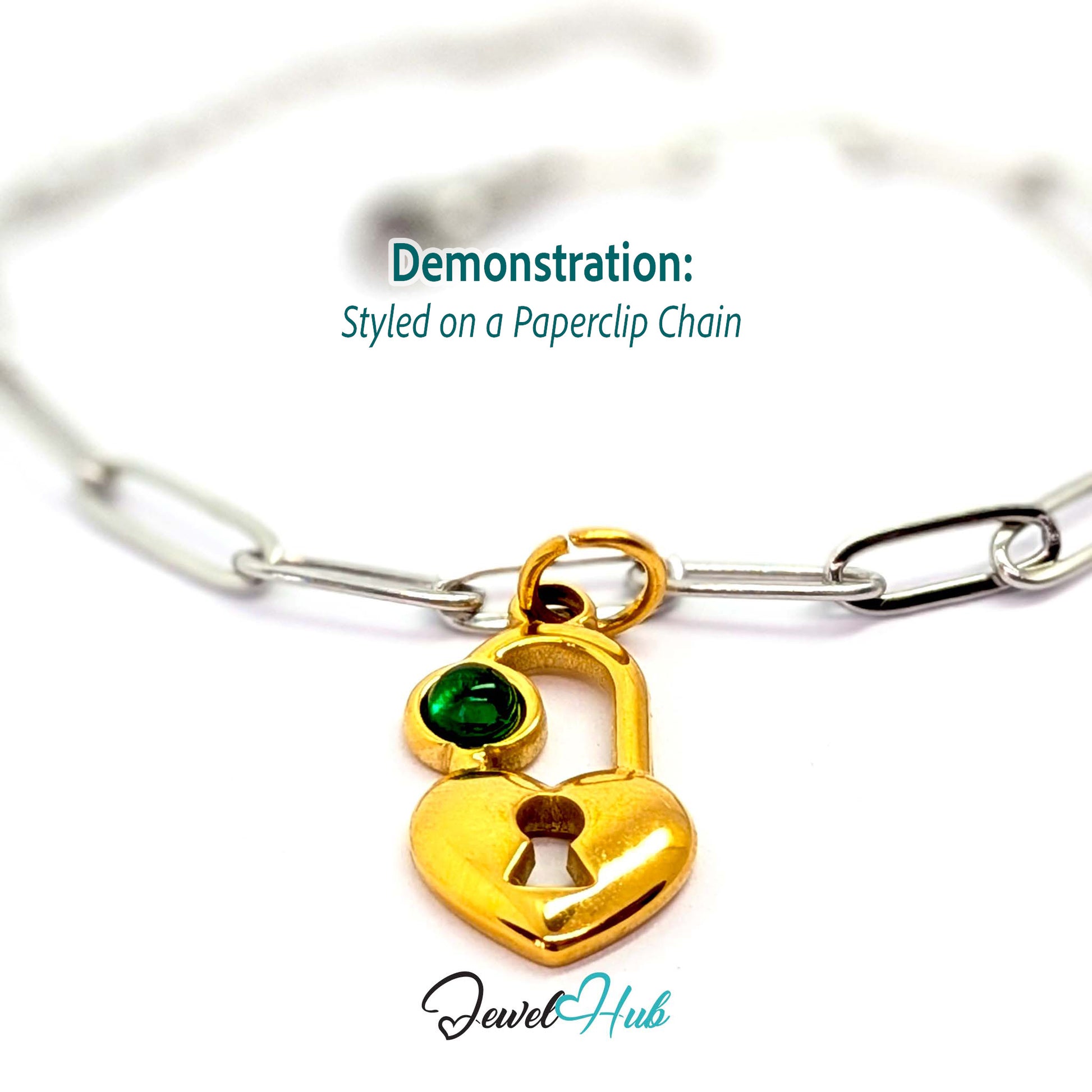 Green stone heart lock charm in gold stainless steel - styled on a silver paperclip chain bracelet - JewelHub