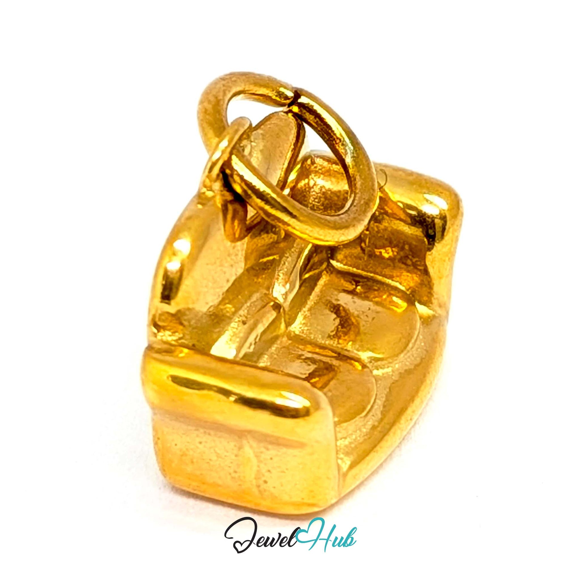 Three-dimensional sofa charm in gold stainless steel - angled view - JewelHub