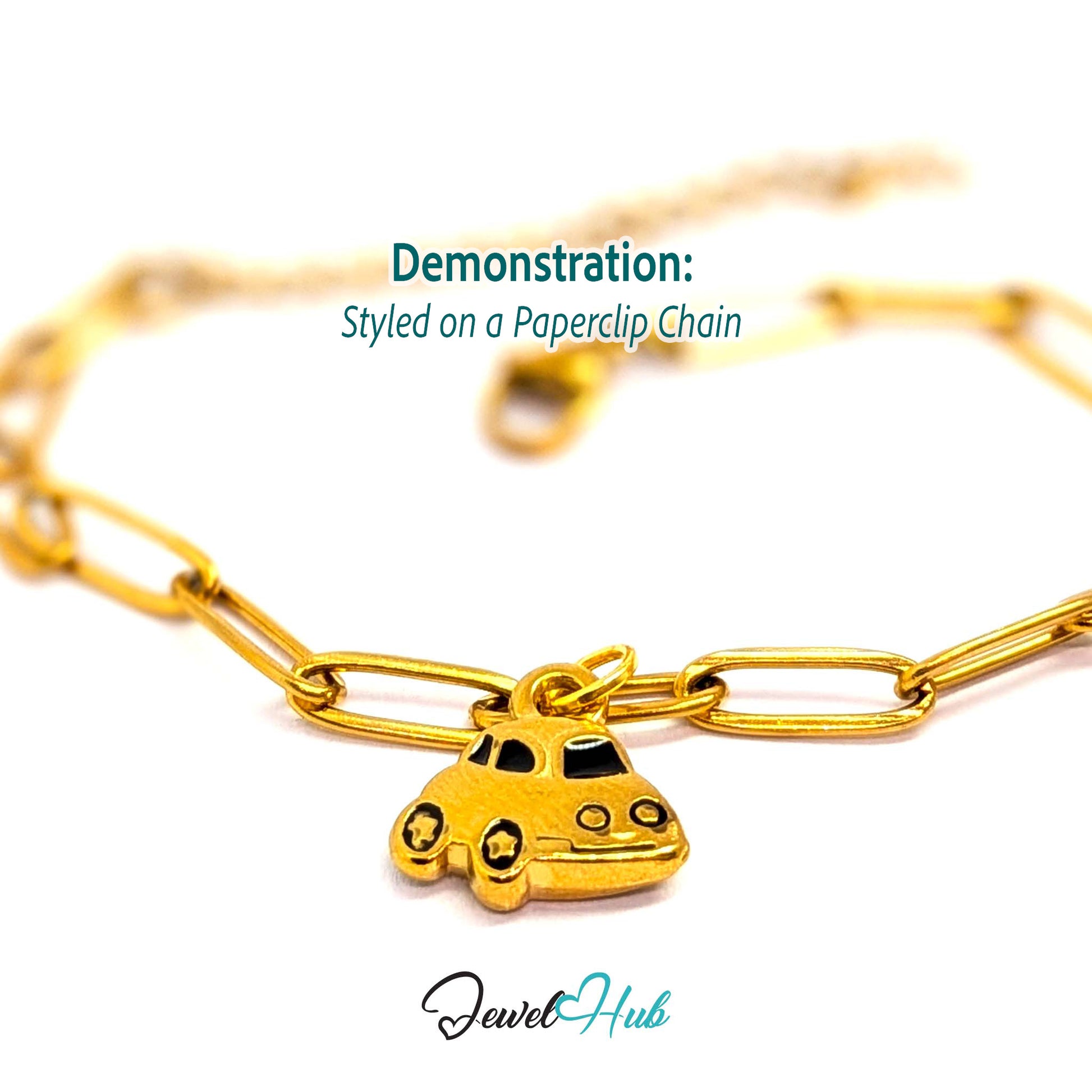 Little car charm in gold stainless steel with black enamel - styled on a gold paperclip chain bracelet - JewelHub