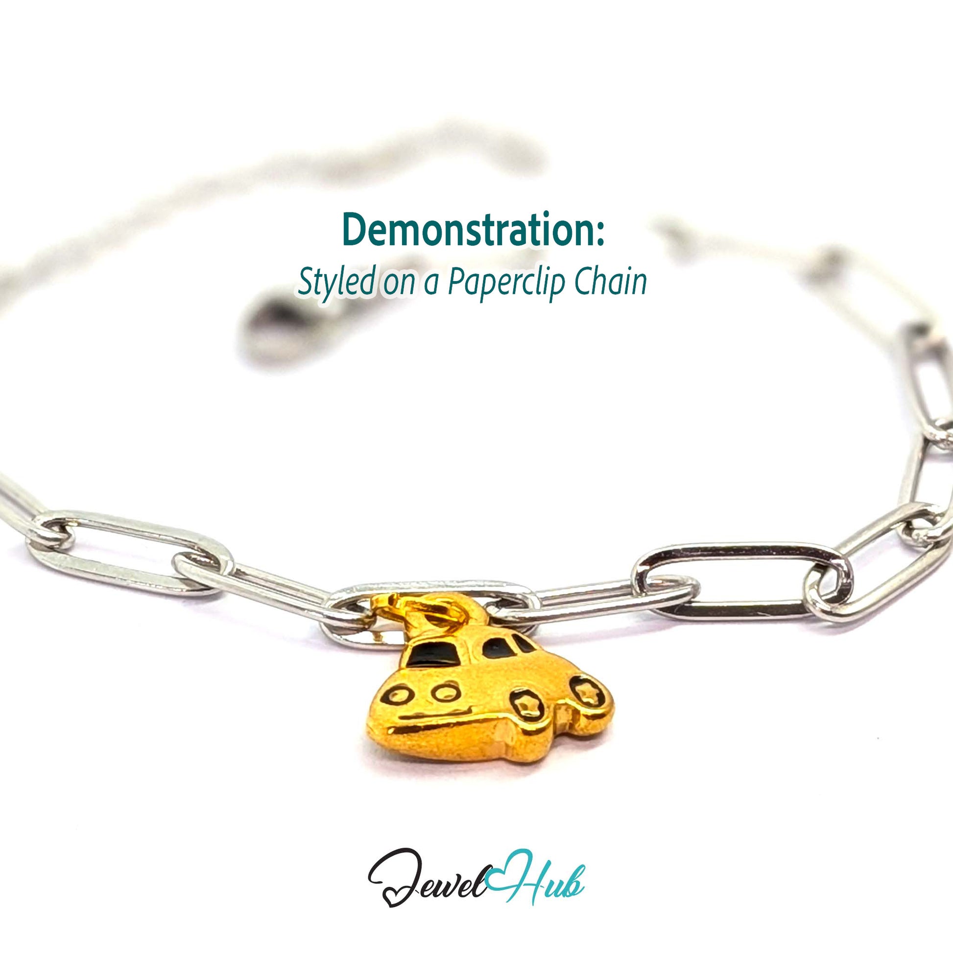 Little car charm in gold stainless steel with black enamel - styled on a silver paperclip chain bracelet - JewelHub