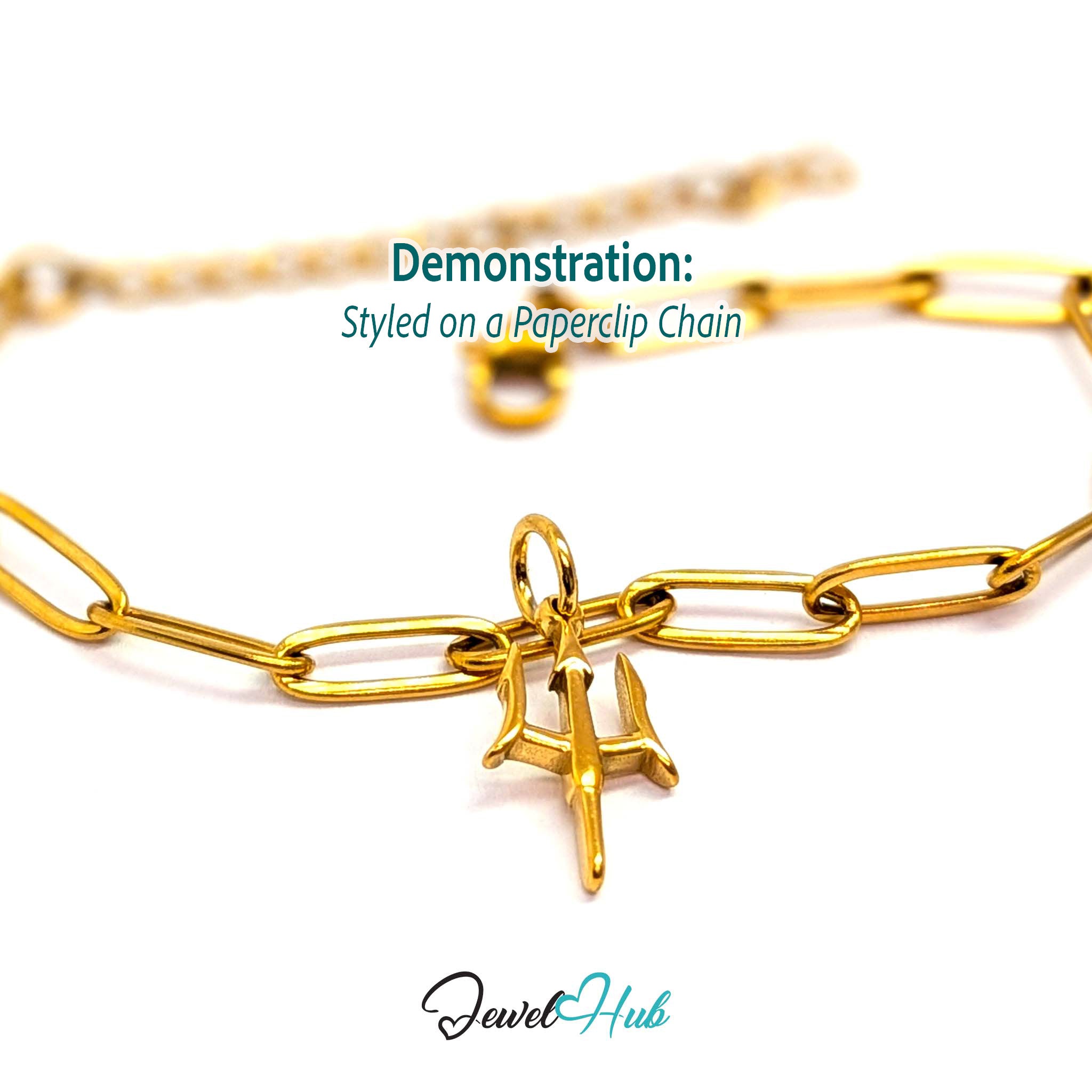Trident charm in gold stainless steel - styled on a gold paperclip chain bracelet - JewelHub