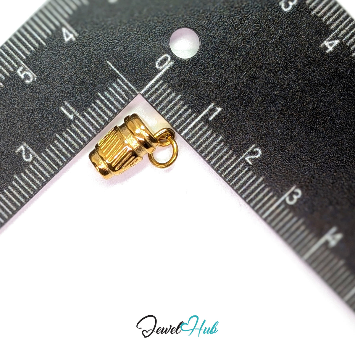 Takeaway coffee cup charm measured against a ruler at 10mm wide by 14.4mm tall - JewelHub