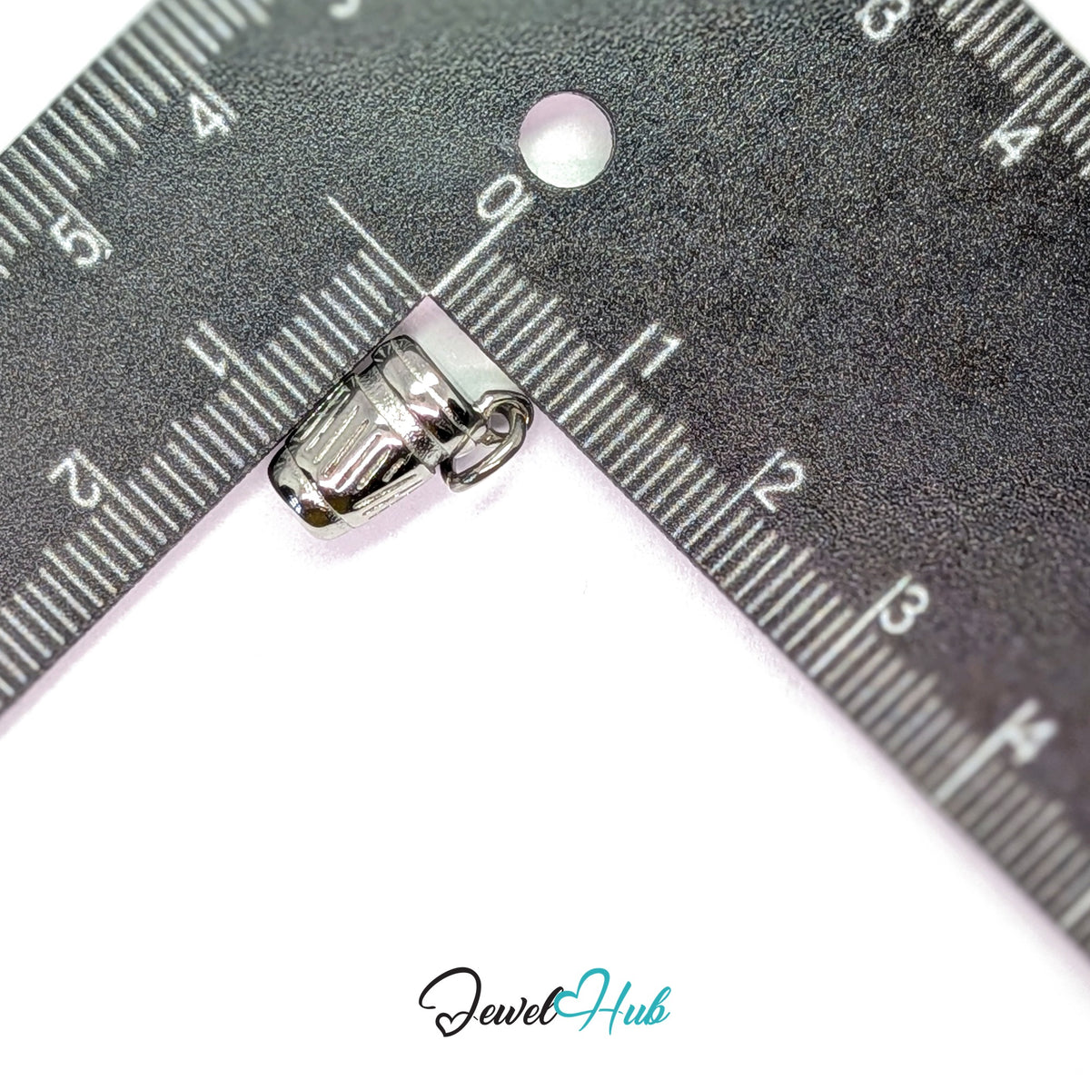 Takeaway coffee cup charm measured against a ruler at 10mm wide by 14.4mm tall - JewelHub