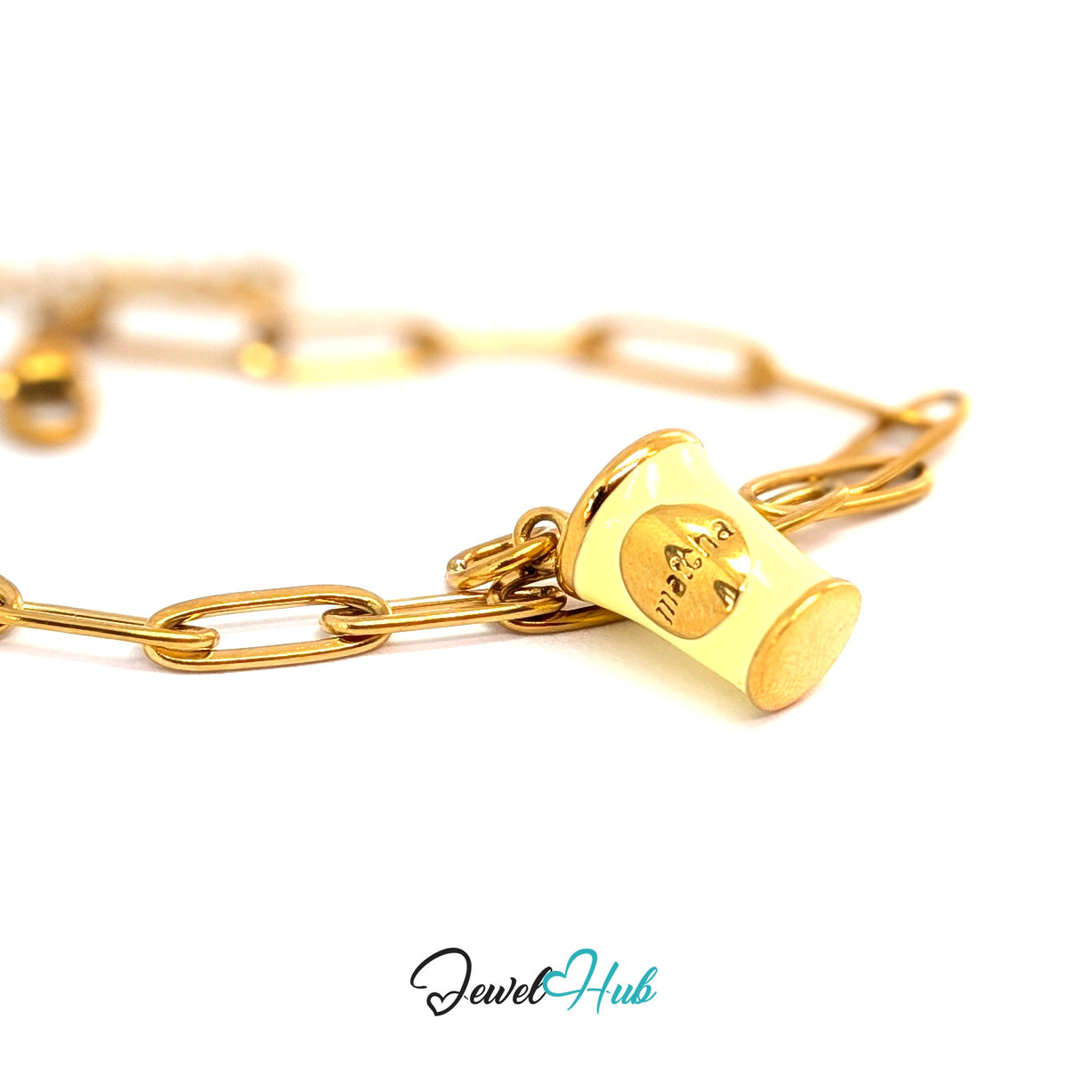 Gold-tone yellow enamel matcha cup charm styled on a gold paperclip chain bracelet - JewelHub