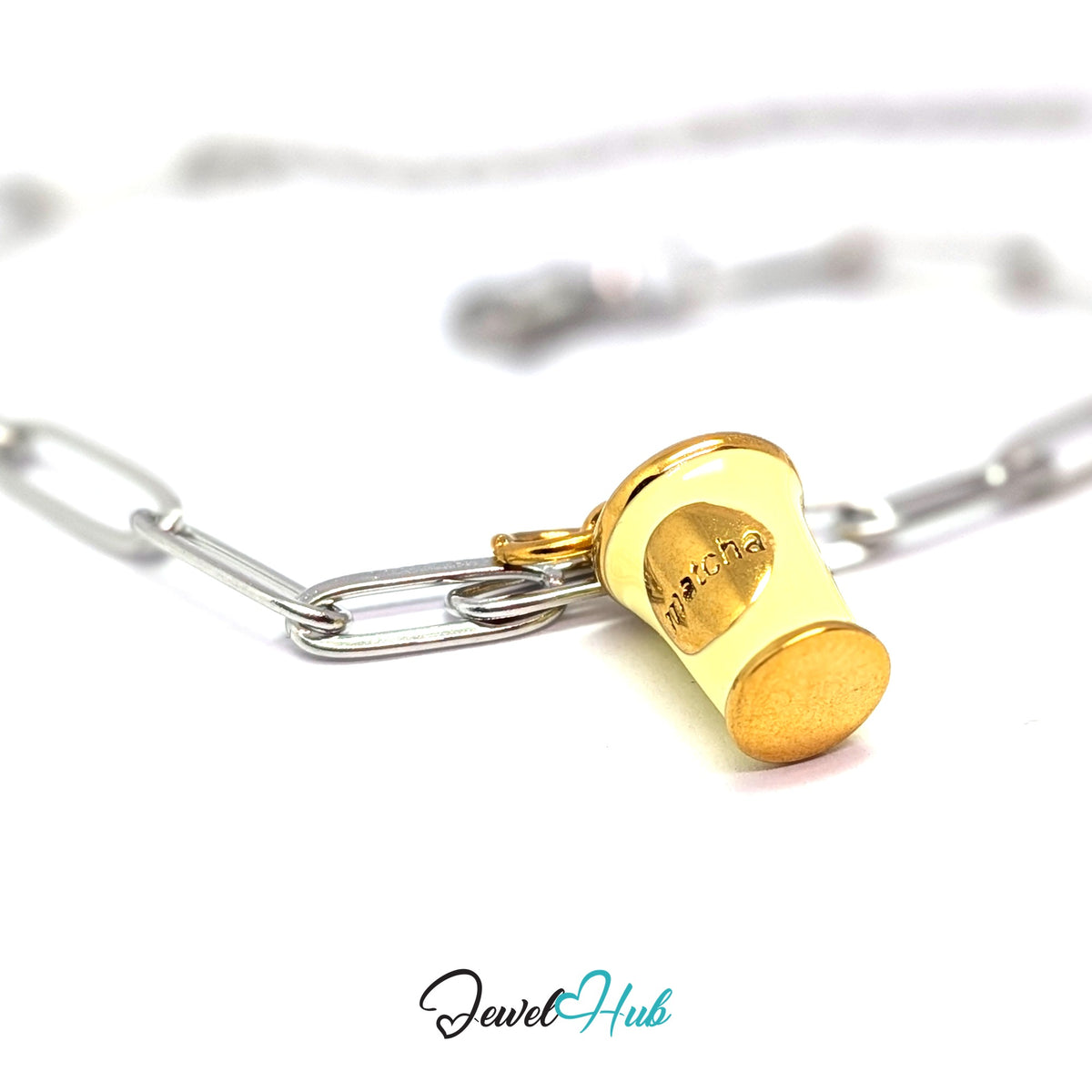 Gold-tone yellow enamel matcha cup charm styled on a silver paperclip chain bracelet for a two-tone look - JewelHub