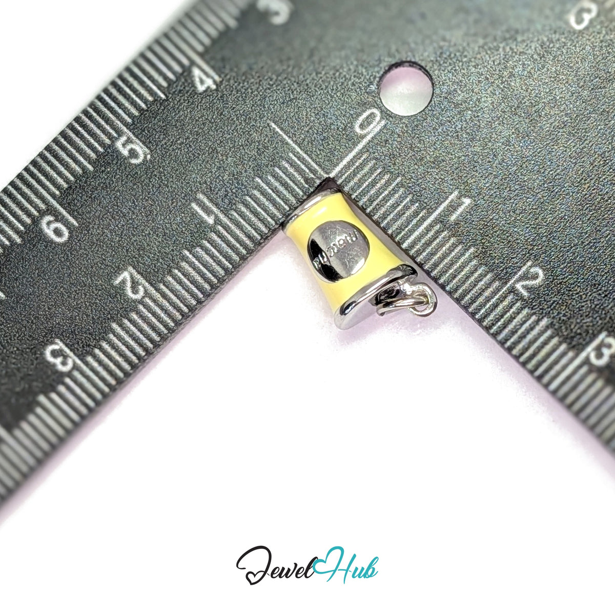 Yellow enamel matcha cup charm measured against a ruler at 9.5mm wide by 16mm tall - JewelHub