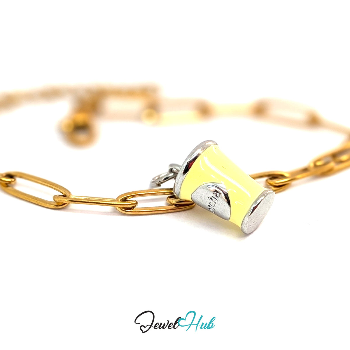 Silver-tone yellow enamel matcha cup charm styled on a gold paperclip chain bracelet for a two-tone look - JewelHub