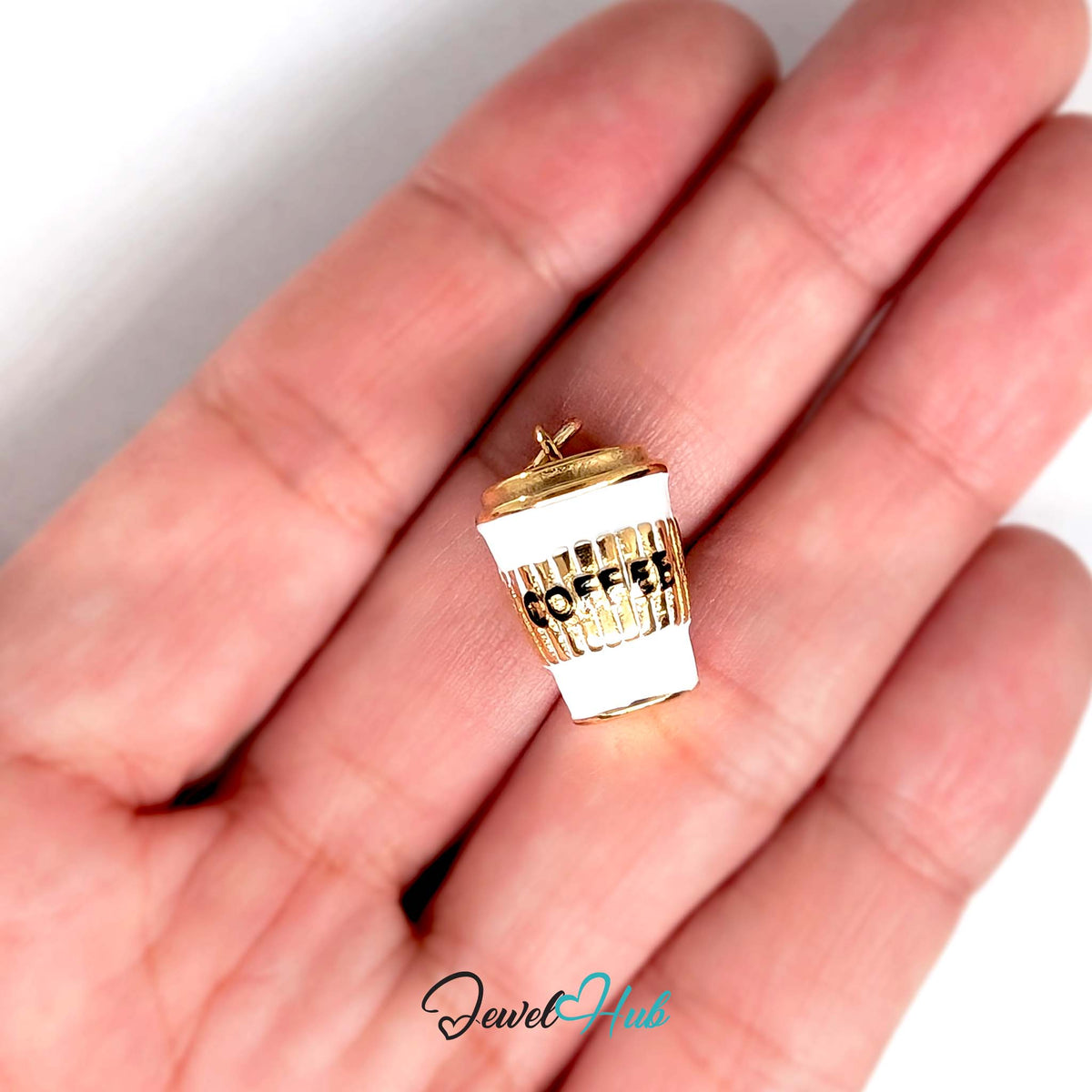 Coffee to go cup charm held in a hand to show its size - JewelHub