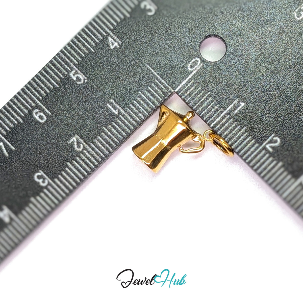 Moka pot charm measured against a ruler at 12.3mm wide by 15mm tall - JewelHub