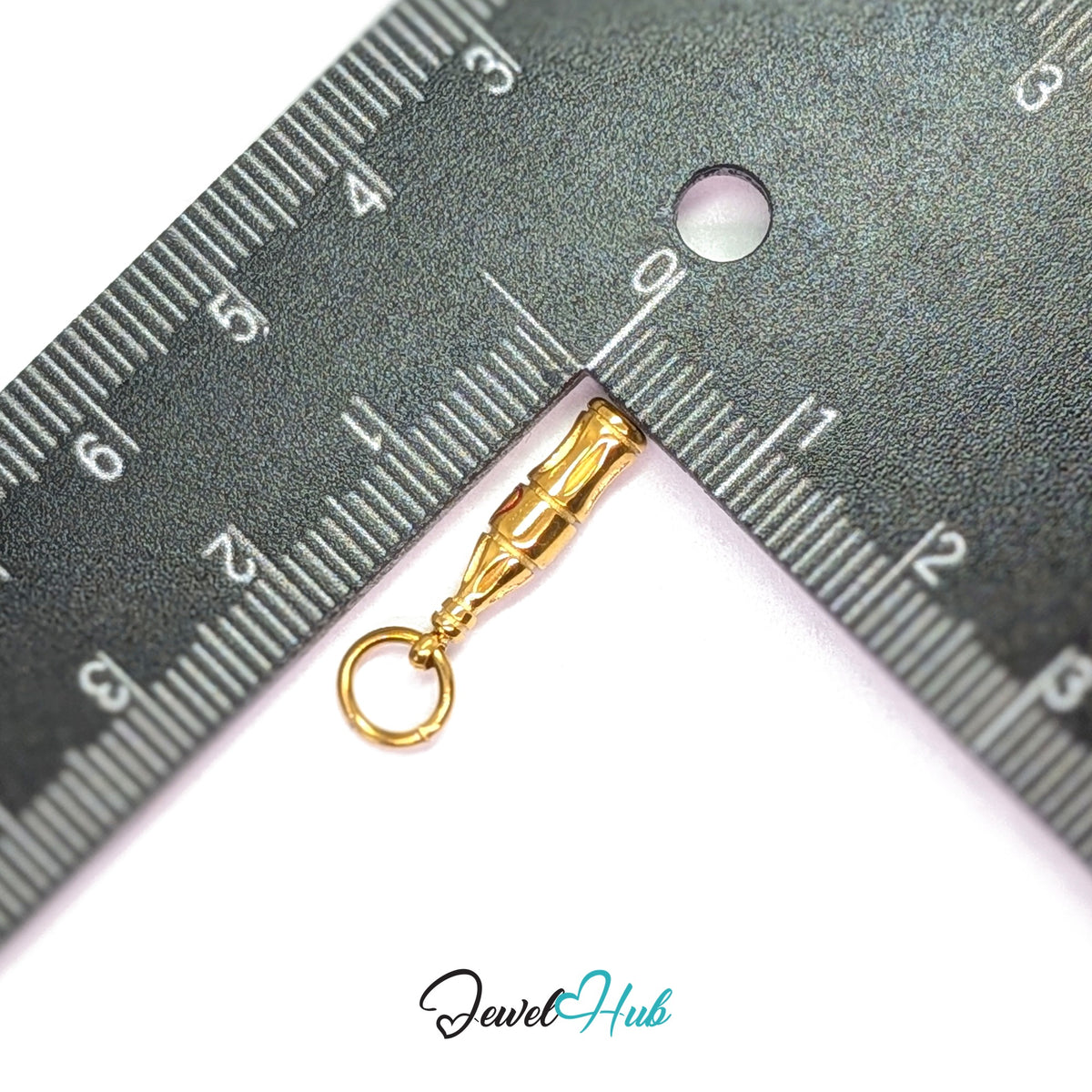 Soda bottle charm measured against a ruler at 4.3mm wide by 18.4mm tall - JewelHub
