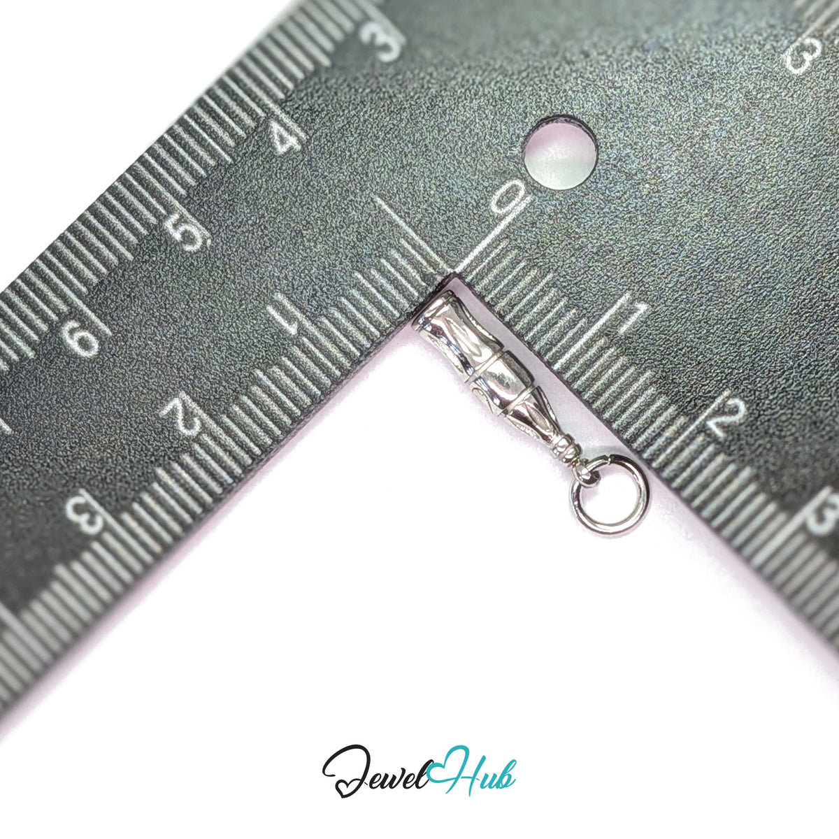 Soda bottle charm measured against a ruler at 4.3mm wide by 18.4mm tall - JewelHub