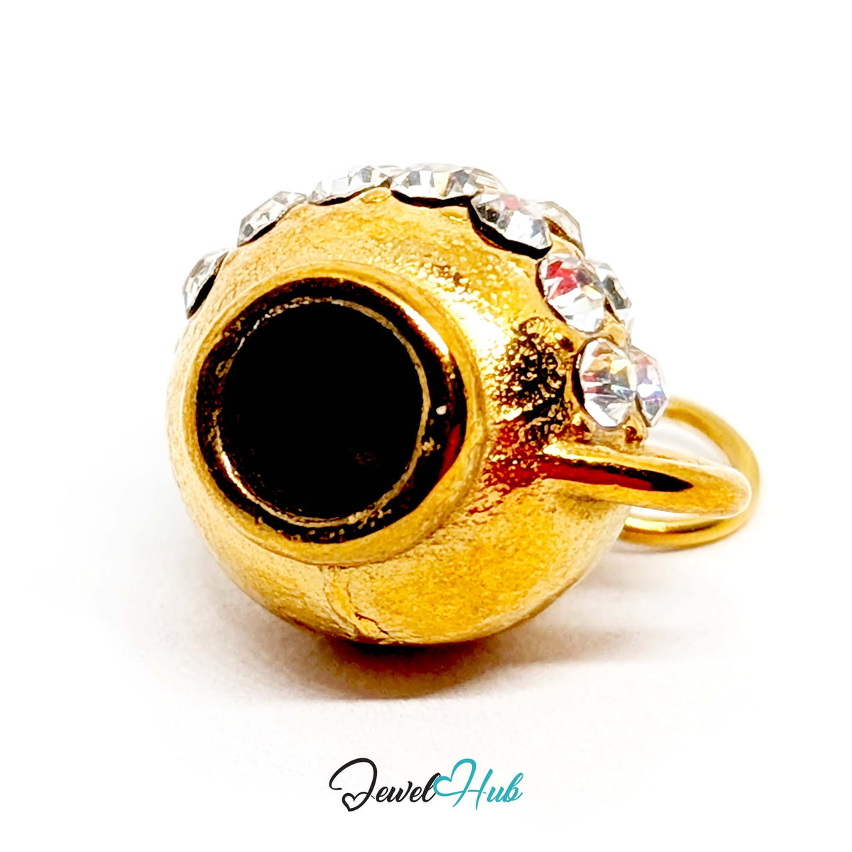 Close-up of the gold-tone crystal teapot charm detail - JewelHub