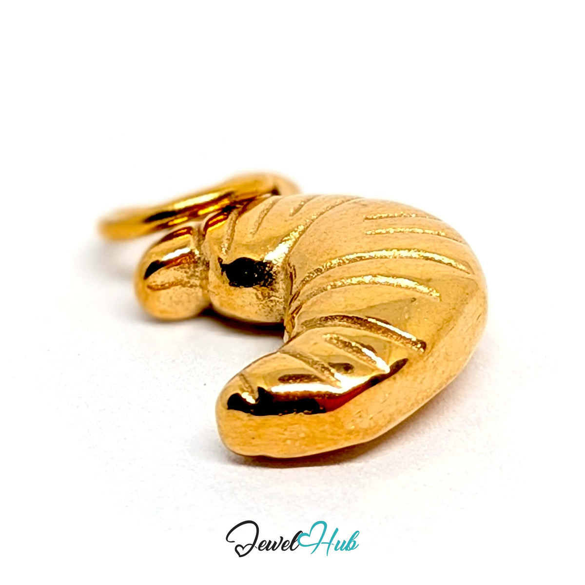 Side view of the gold-tone curved croissant charm - JewelHub
