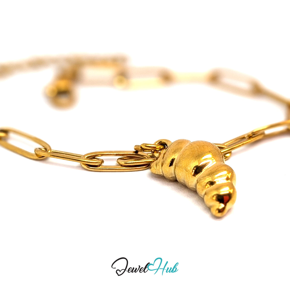 Gold-tone curved croissant charm styled on a gold paperclip chain bracelet - JewelHub