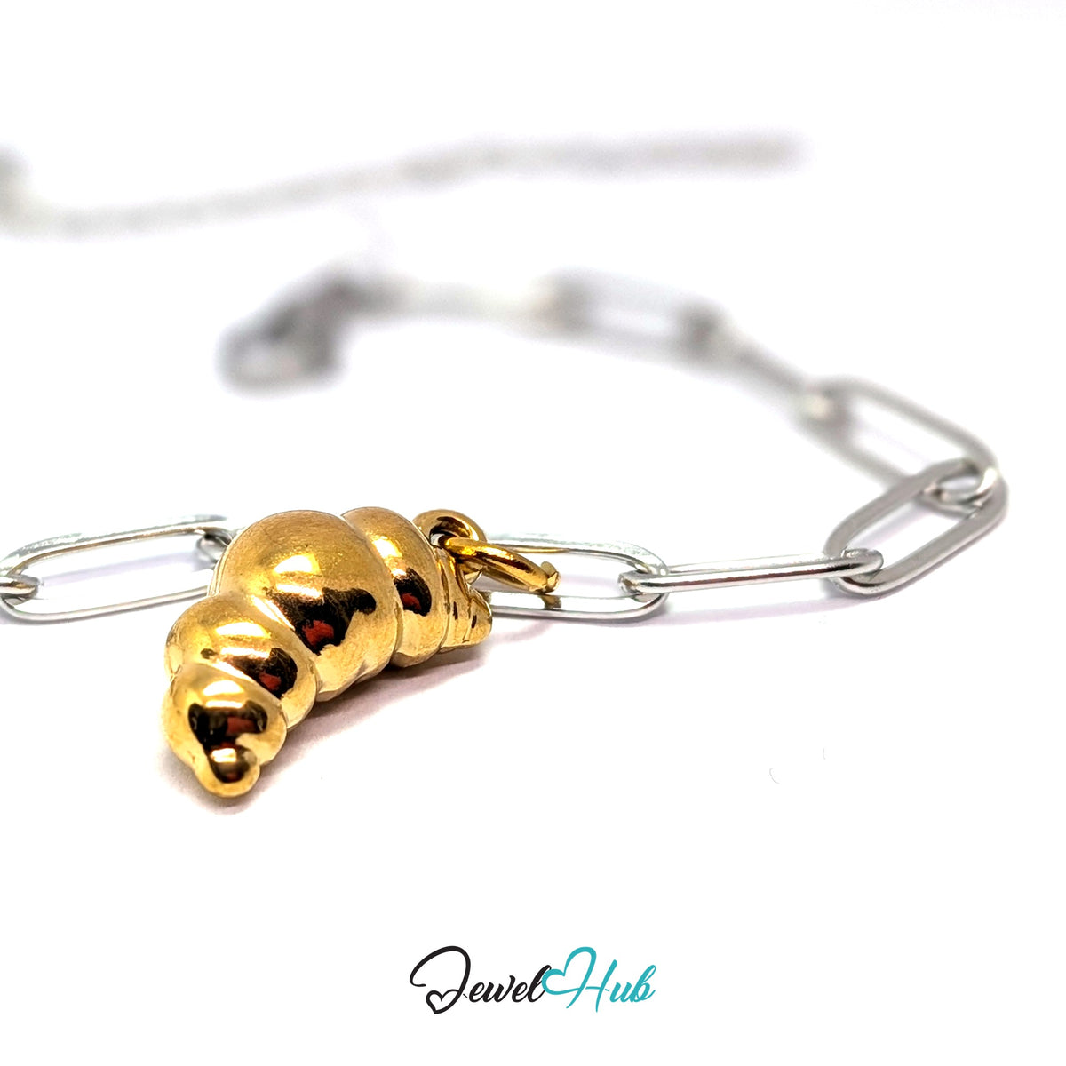 Gold-tone curved croissant charm styled on a silver paperclip chain bracelet for a two-tone look - JewelHub