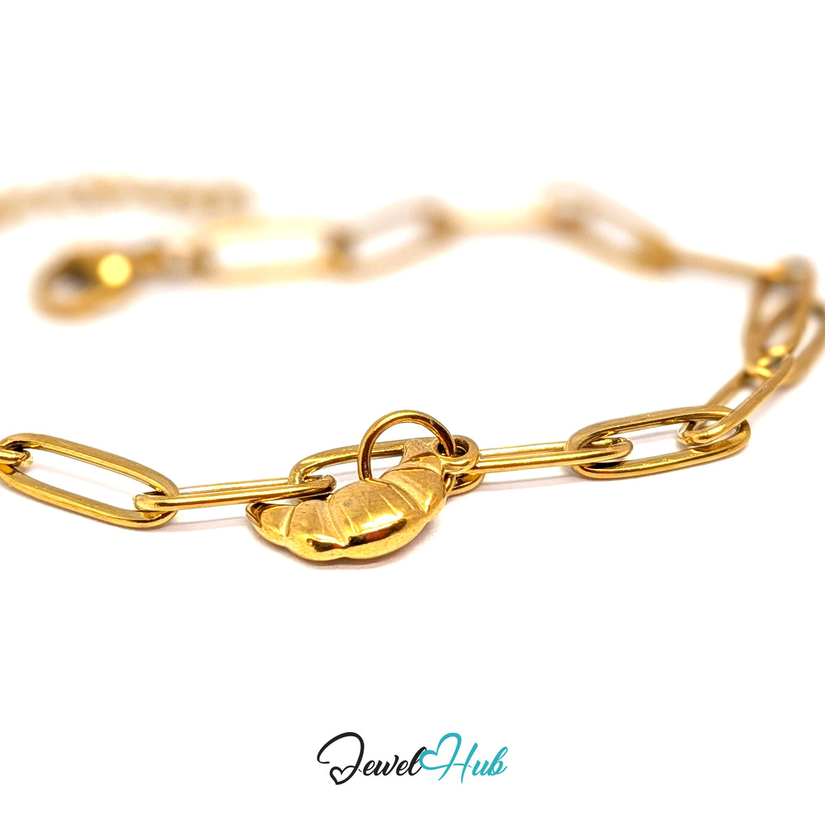 Gold-tone mini croissant charm styled on a gold paperclip chain bracelet - JewelHub