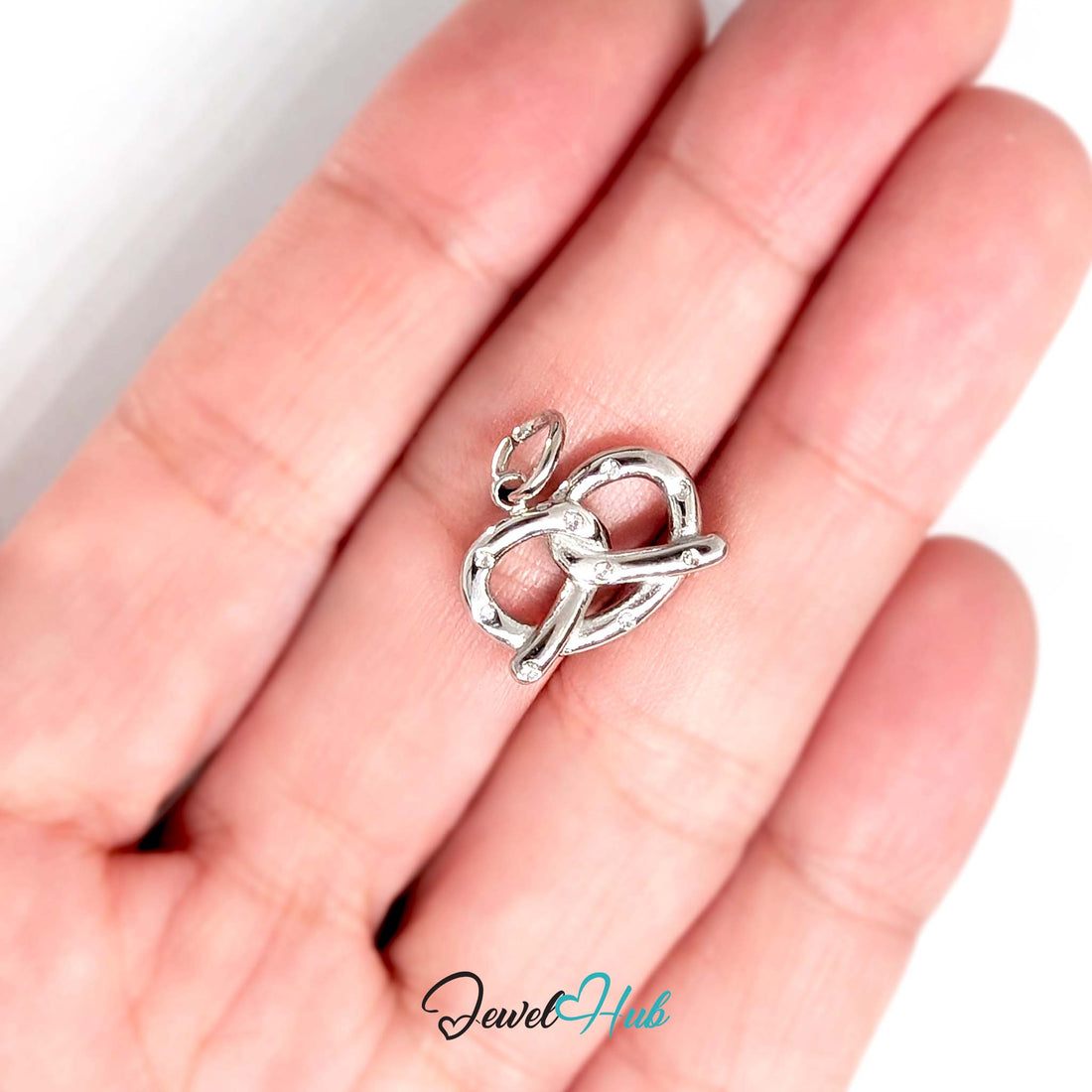 Pretzel charm in silver-tone stainless steel, with 9 glue-set crystals - JewelHub