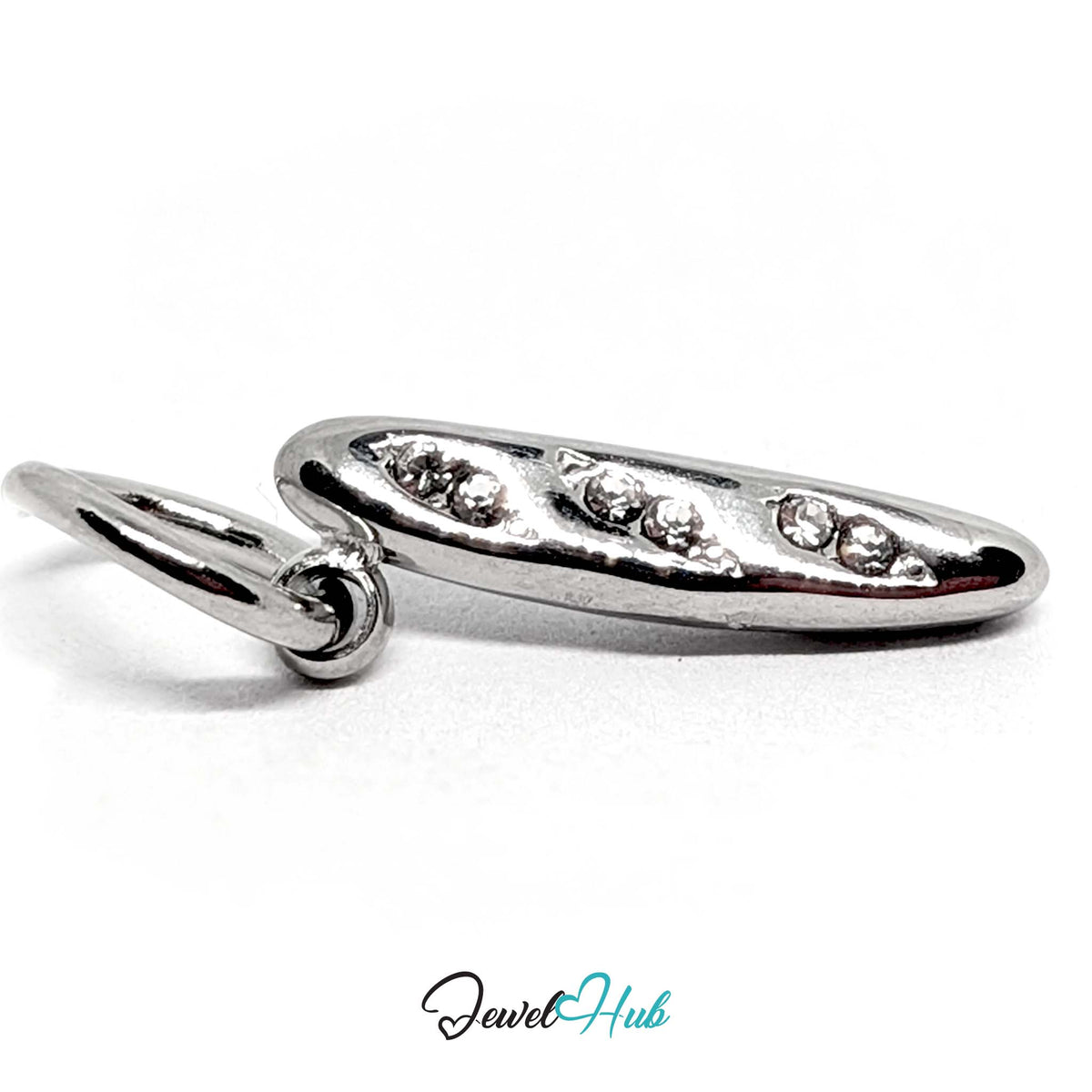 Angled view of the silver-tone crystal baguette charm - JewelHub