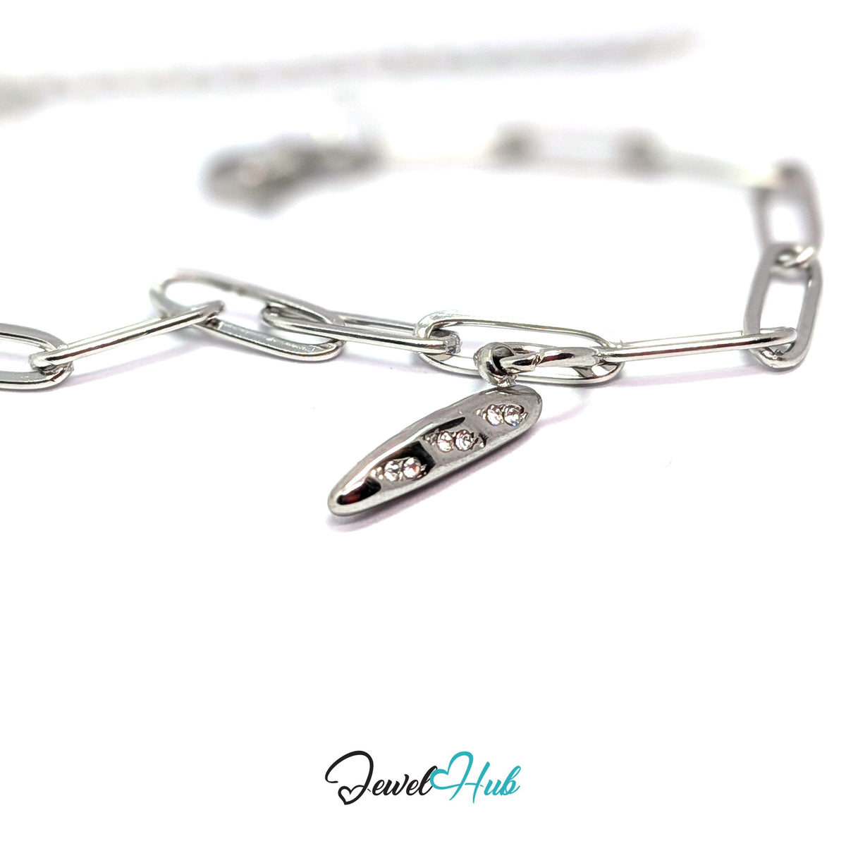 Silver-tone crystal baguette charm styled on a silver paperclip chain bracelet - JewelHub