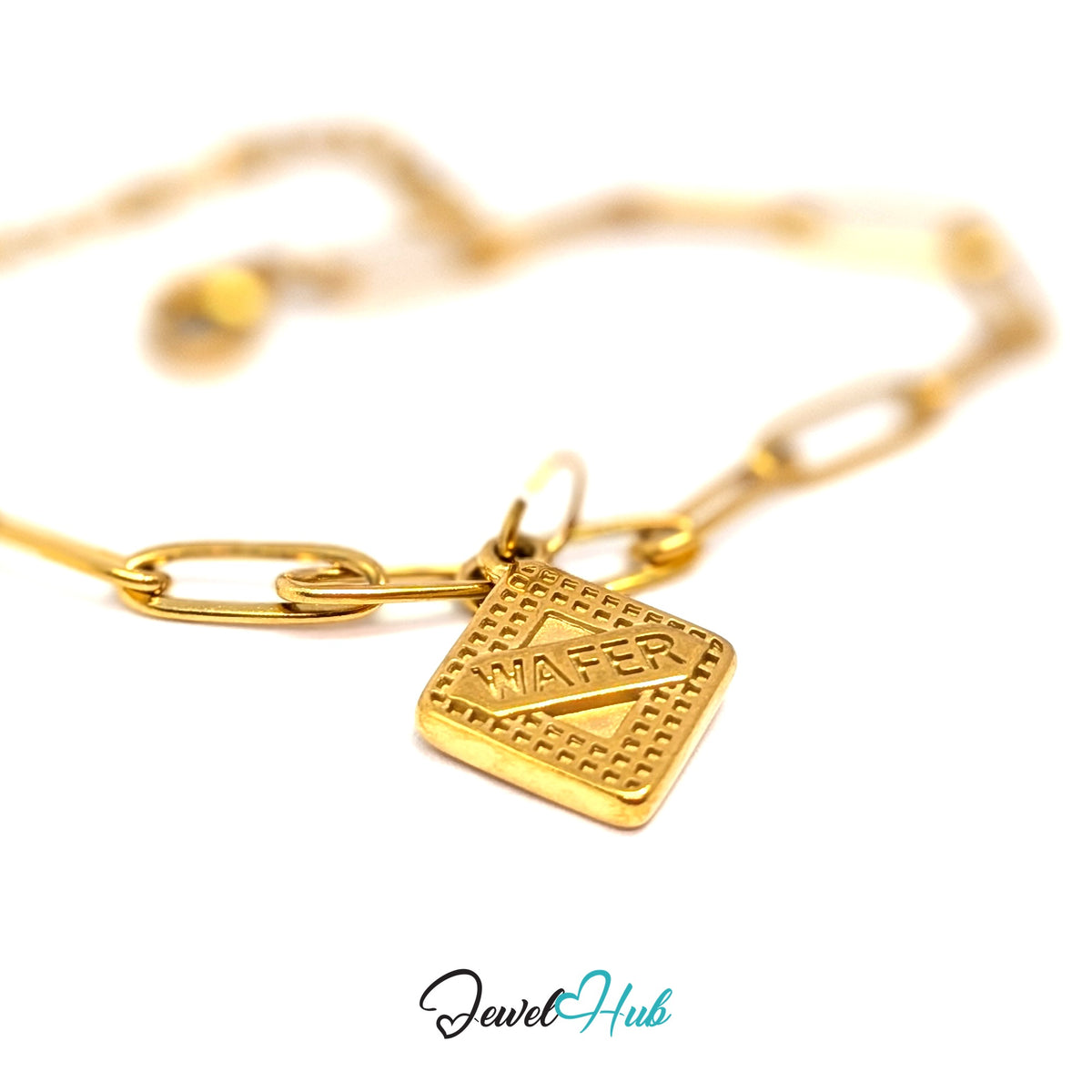 Gold-tone wafer biscuit charm styled on a gold paperclip chain bracelet - JewelHub