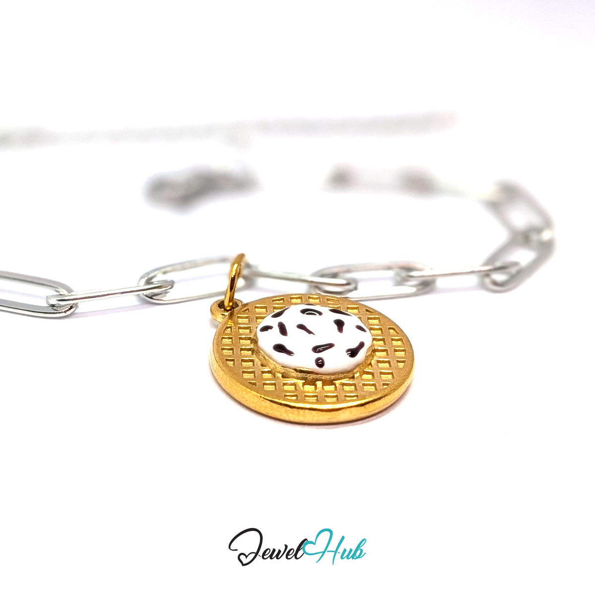Gold-tone cookies and cream waffle charm styled on a silver paperclip chain bracelet for a two-tone look - JewelHub