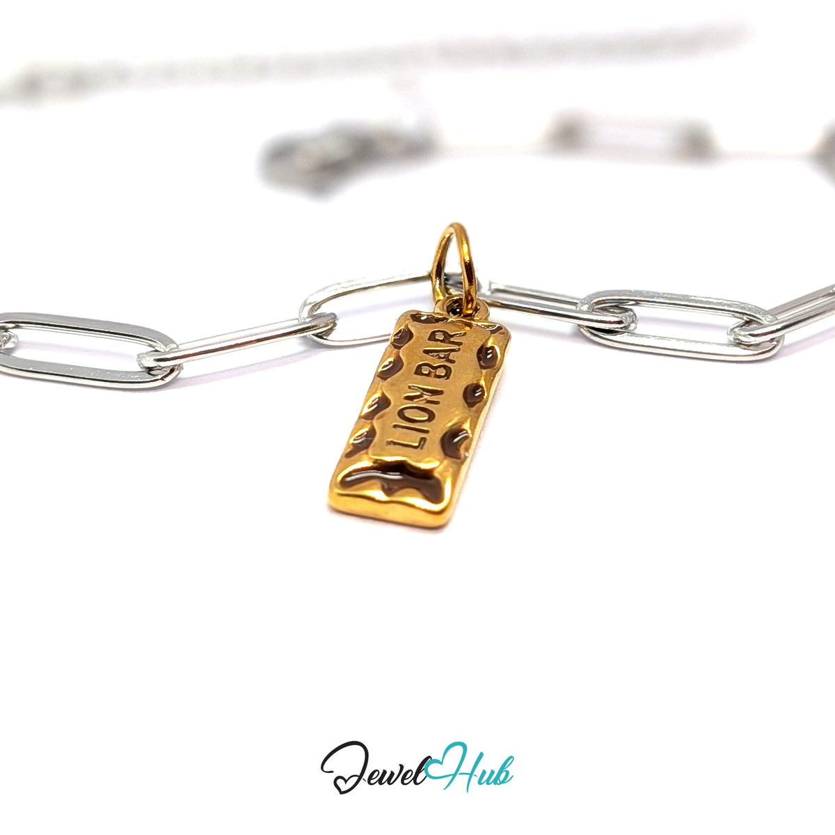 Gold-tone chocolate bar charm styled on a silver paperclip chain bracelet for a two-tone look - JewelHub