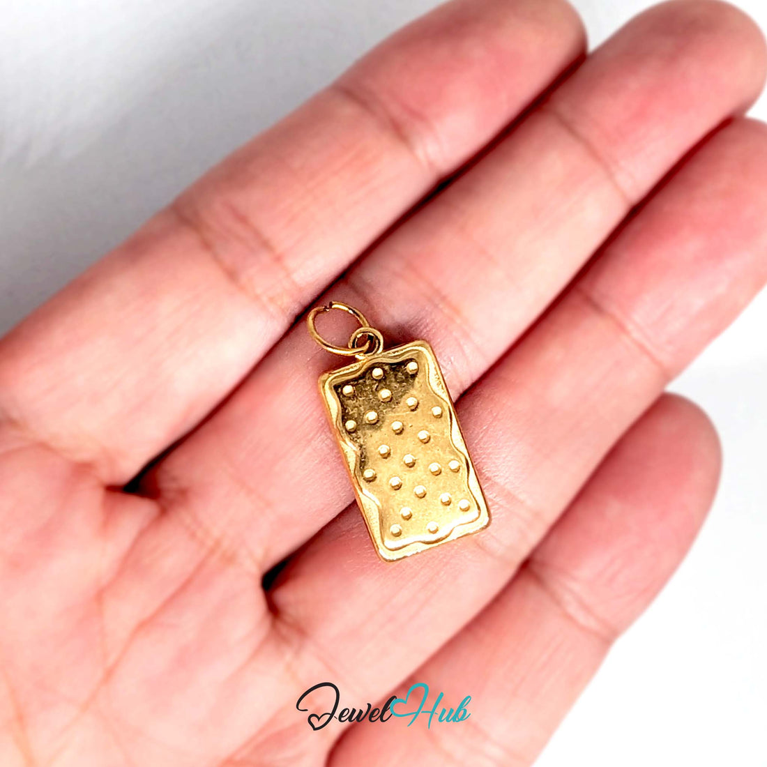 Dotted biscuit charm in gold-tone stainless steel - JewelHub
