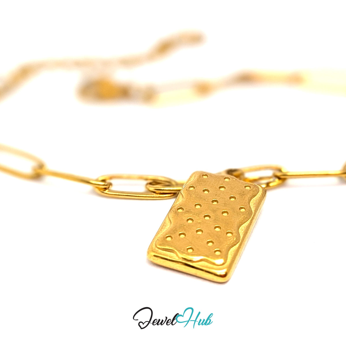 Gold-tone dotted biscuit charm styled on a gold paperclip chain bracelet - JewelHub