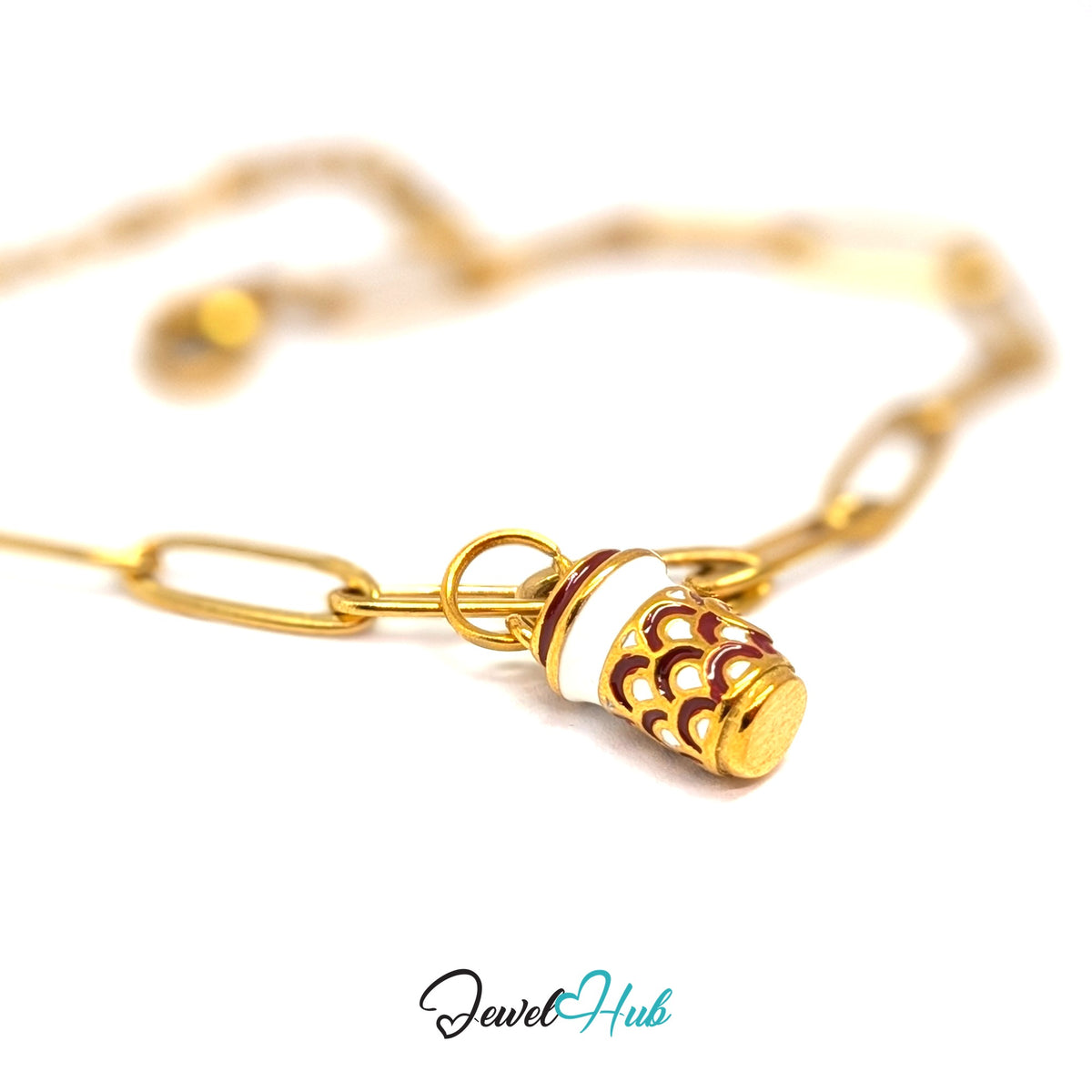Gold-tone heart patterned coffee cup charm styled on a gold paperclip chain bracelet - JewelHub