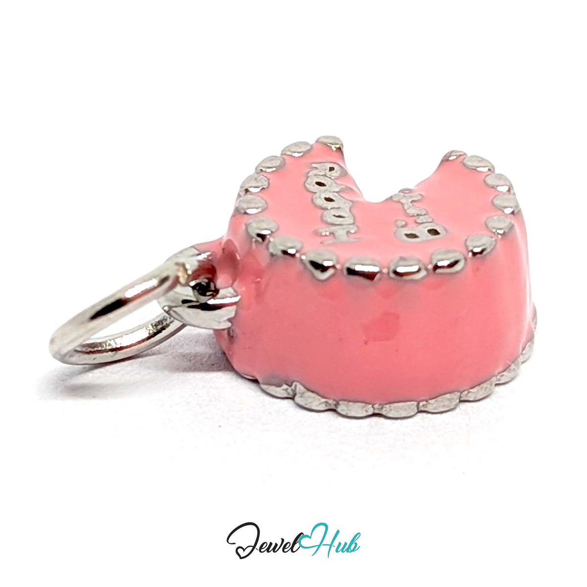Angled view of the silver-tone pink birthday cake charm - JewelHub