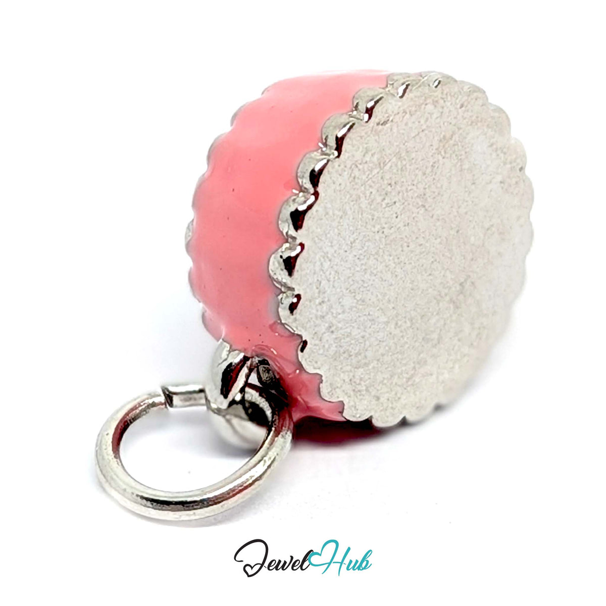 Close-up of the silver-tone pink birthday cake charm detail - JewelHub