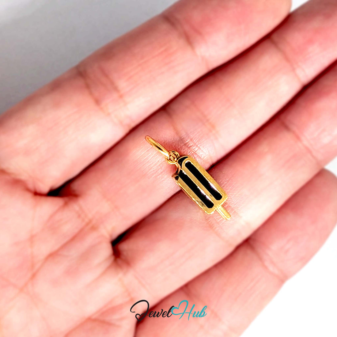 Black stripe ice lolly charm in gold-tone stainless steel - JewelHub