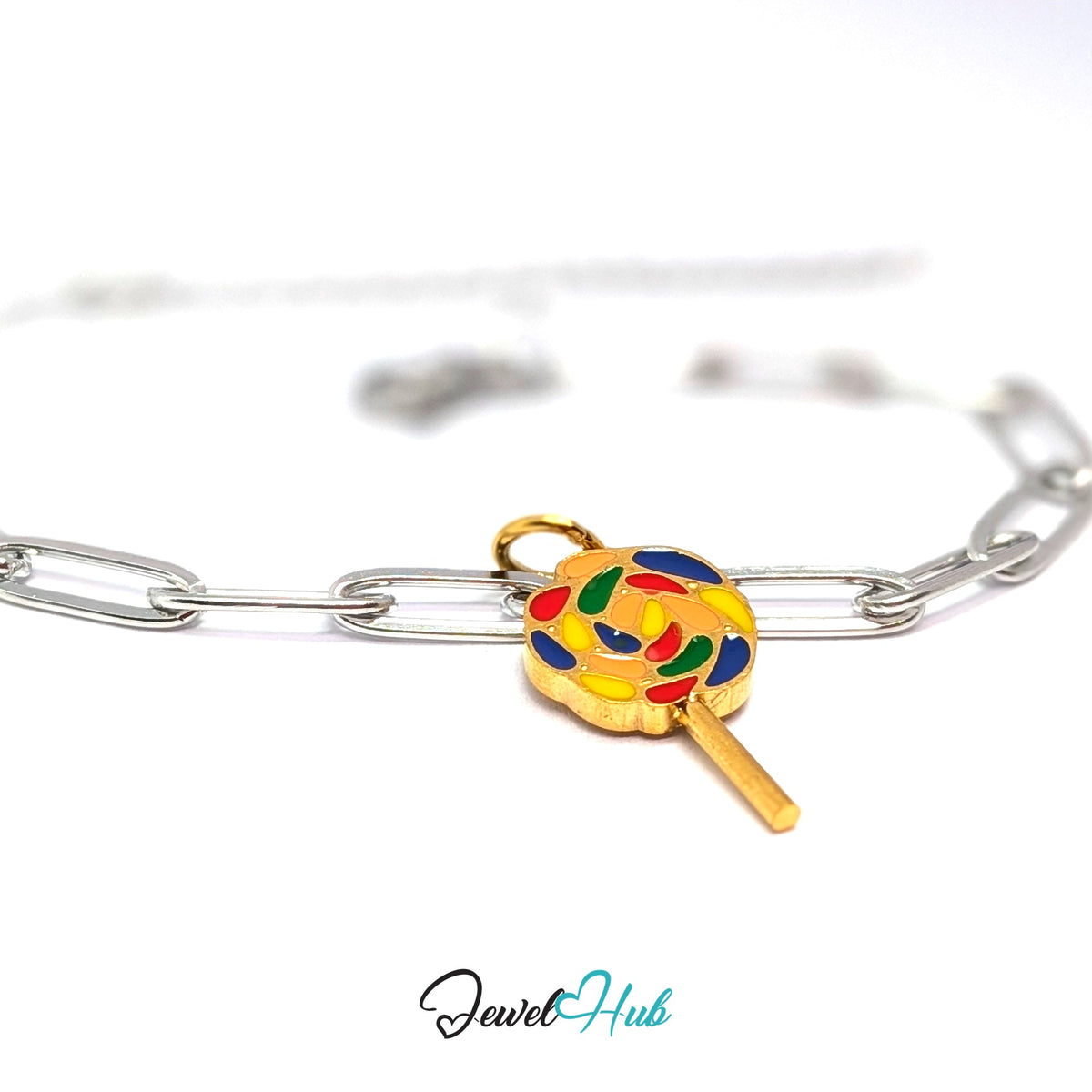 Gold-tone rainbow swirl lollipop charm styled on a silver paperclip chain bracelet for a two-tone look - JewelHub