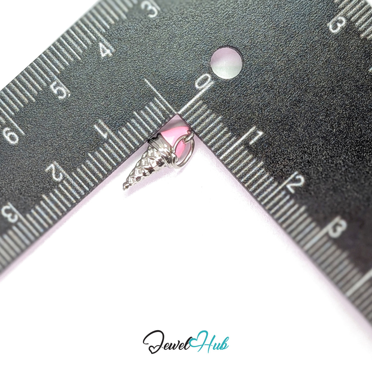 Pink scoop ice cream cone charm measured against a ruler at 6mm wide by 14.7mm tall - JewelHub