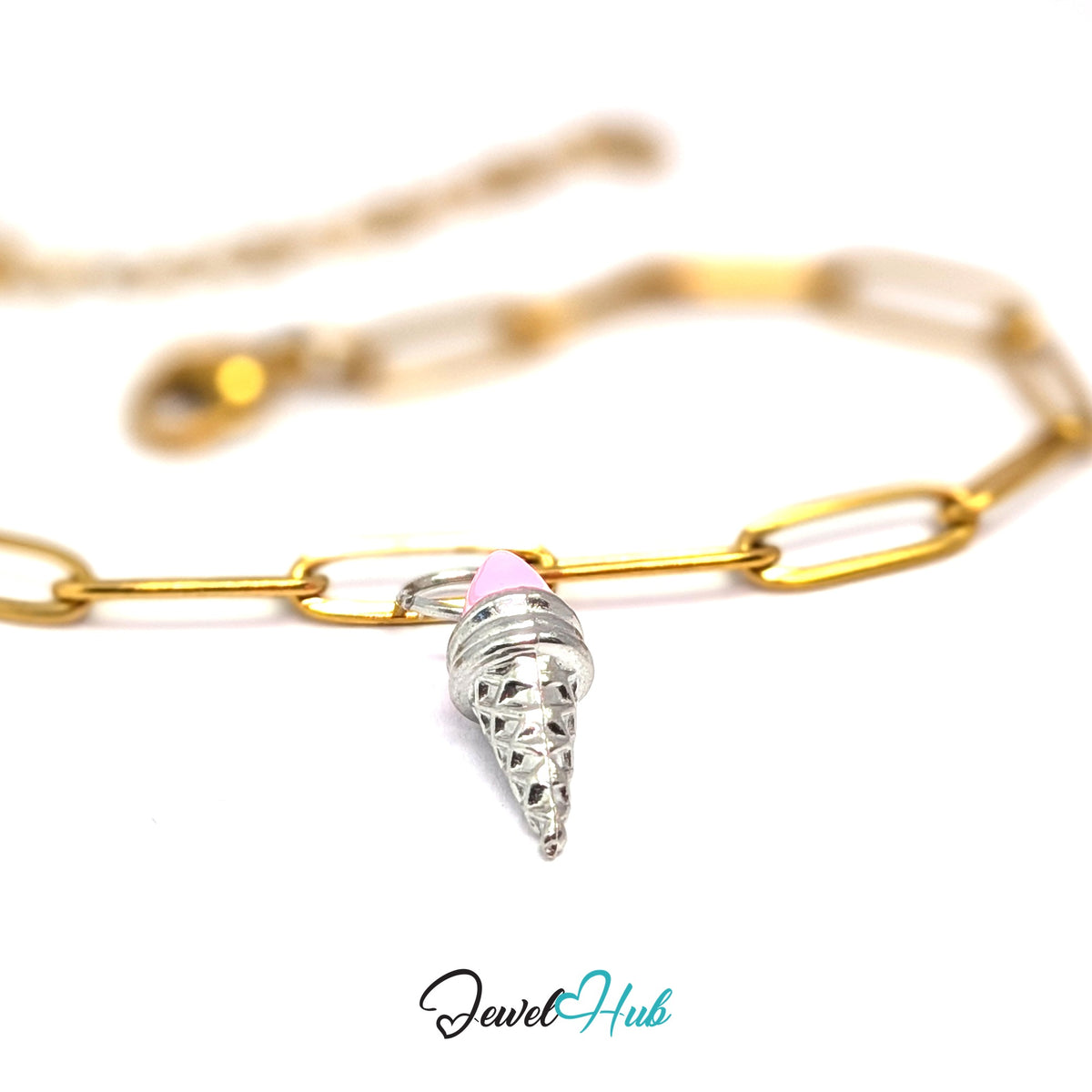 Silver-tone pink scoop ice cream cone charm styled on a gold paperclip chain bracelet for a two-tone look - JewelHub