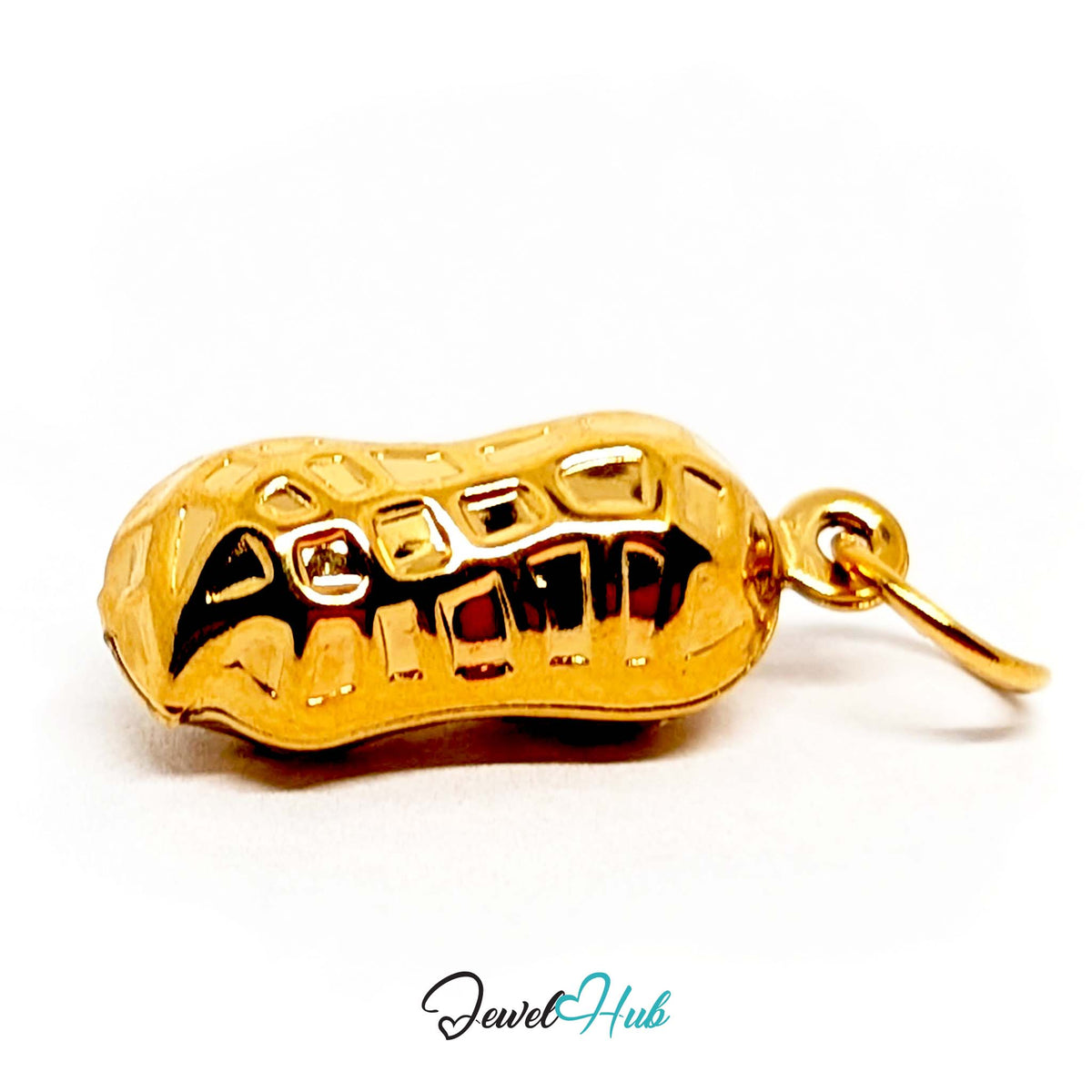 Angled view of the gold-tone hammered peanut charm - JewelHub