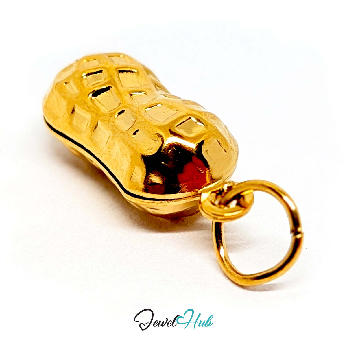 Close-up of the gold-tone hammered peanut charm detail - JewelHub