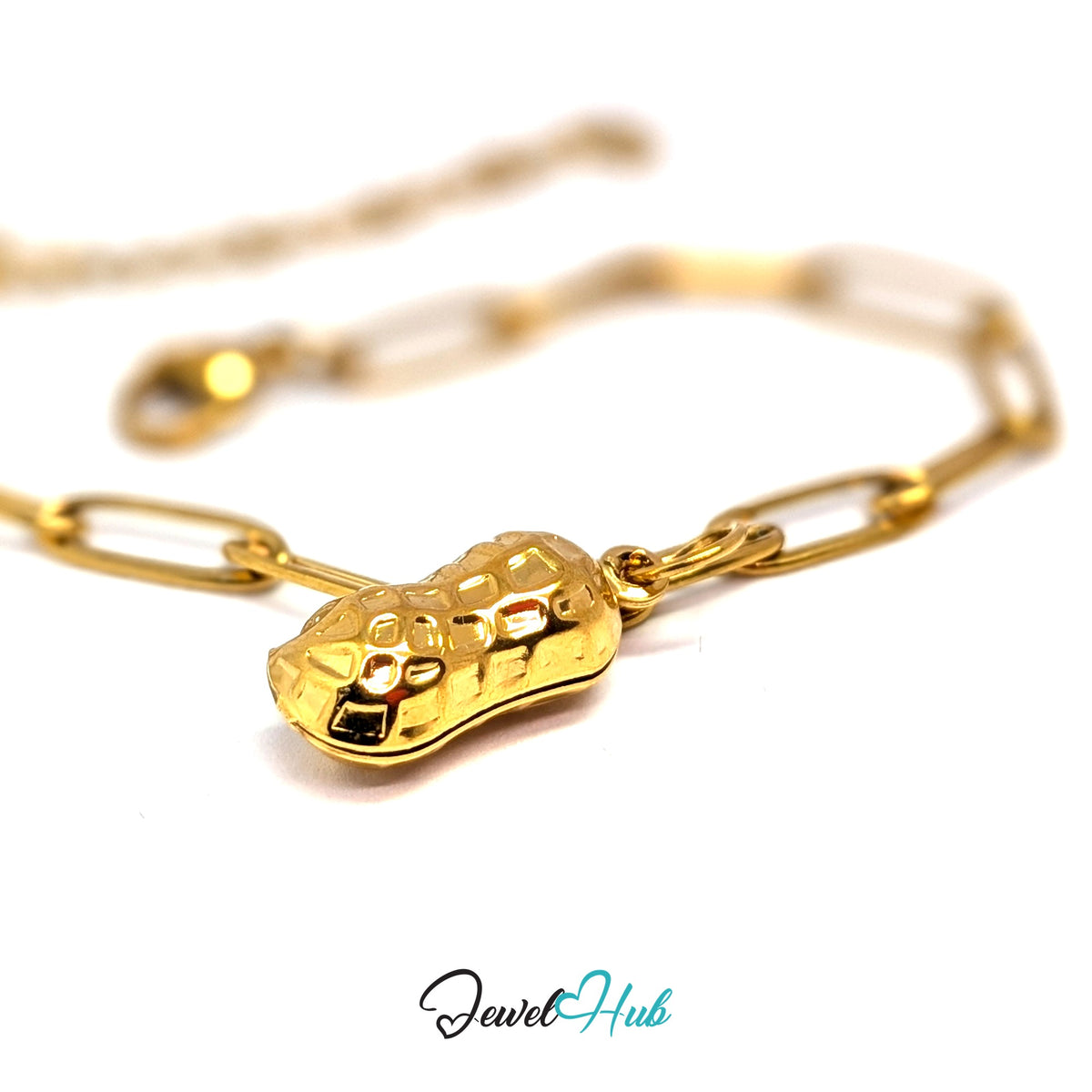 Gold-tone hammered peanut charm styled on a gold paperclip chain bracelet - JewelHub