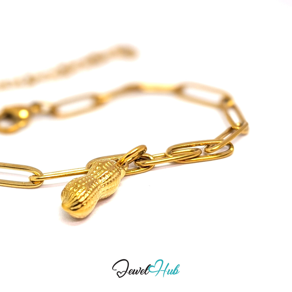 Gold-tone dotted peanut charm styled on a gold paperclip chain bracelet - JewelHub