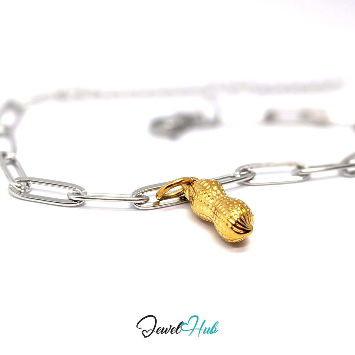 Gold-tone dotted peanut charm styled on a silver paperclip chain bracelet for a two-tone look - JewelHub