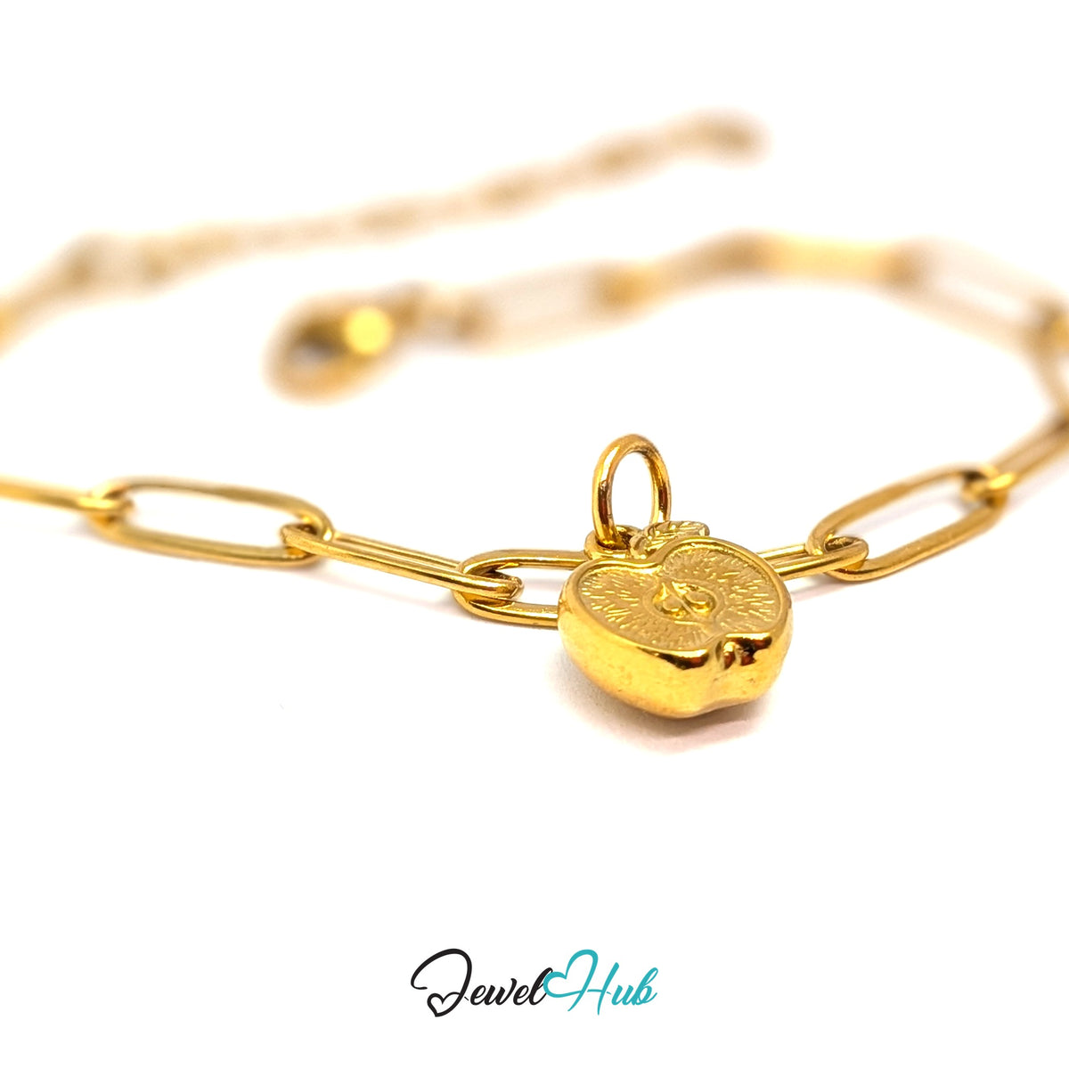 Gold-tone apple half charm styled on a gold paperclip chain bracelet - JewelHub