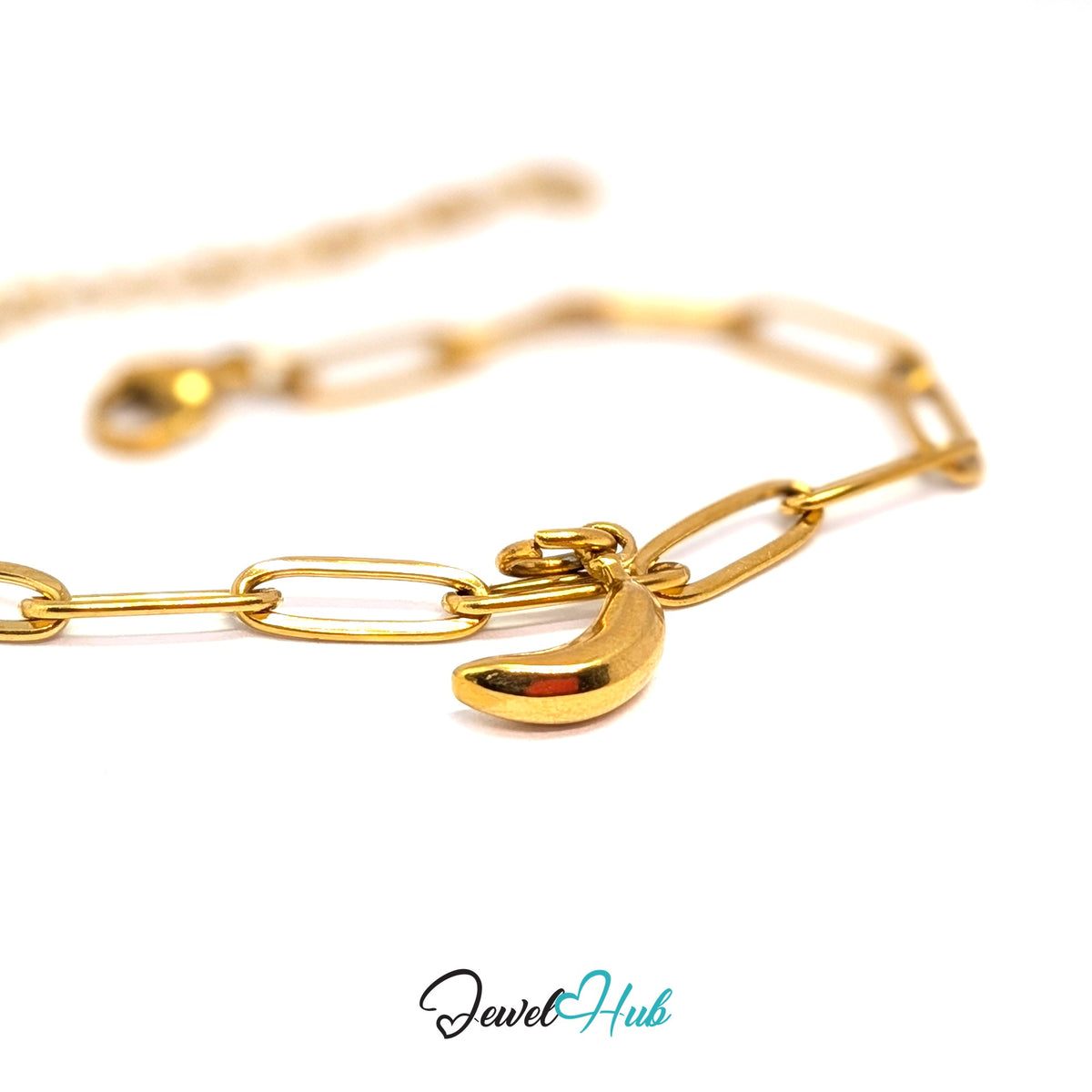 Gold-tone polished banana charm styled on a gold paperclip chain bracelet - JewelHub