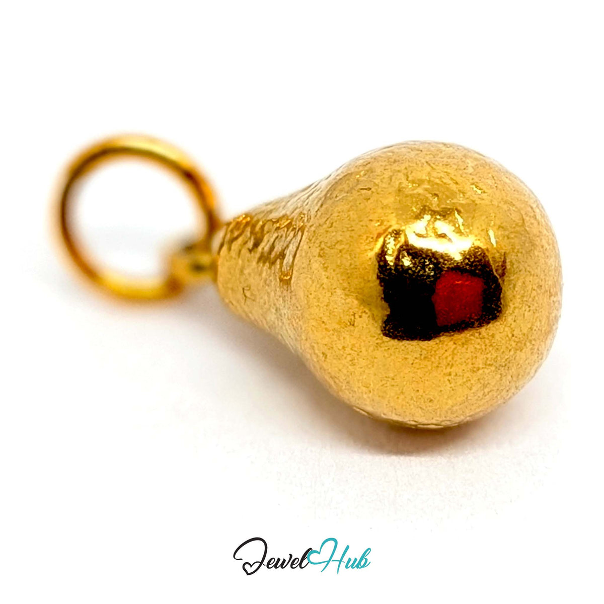 Side view of the gold-tone hammered pear charm - JewelHub