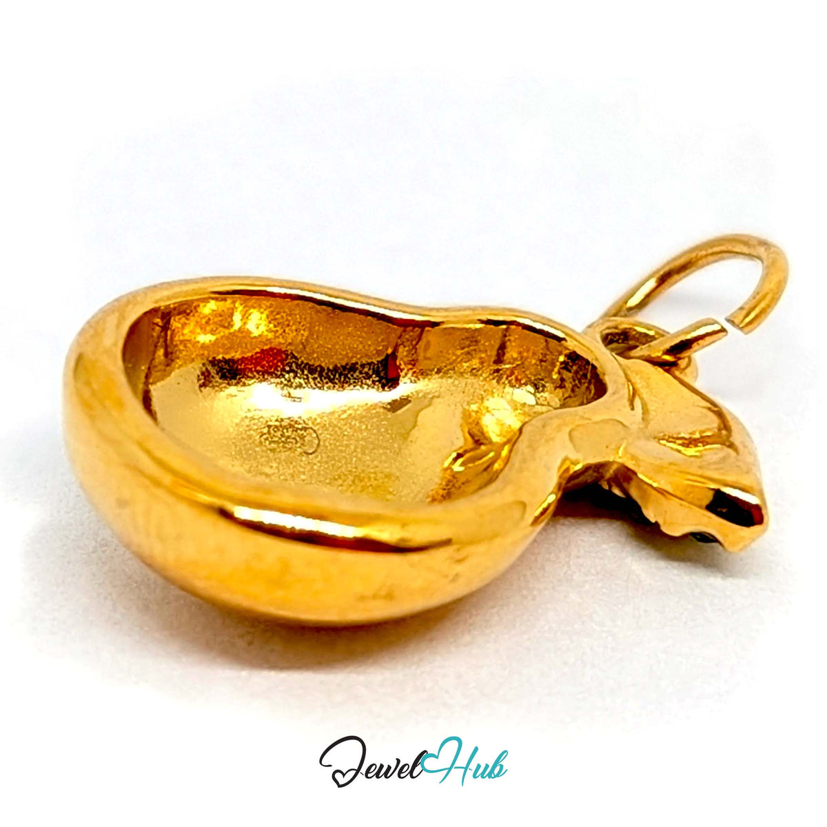 Close-up of the gold-tone crystal leaf pear charm detail - JewelHub